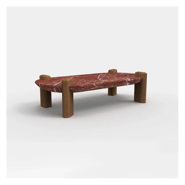 Diseñada para ser el centro de atención de interiores refinados, la Mesa de centro Arcus de Essentia Home es una mezcla perfecta de fuerza arquitectónica y belleza orgánica. El rico tablero de piedra veteada irradia un lujo atemporal, ofreciendo un