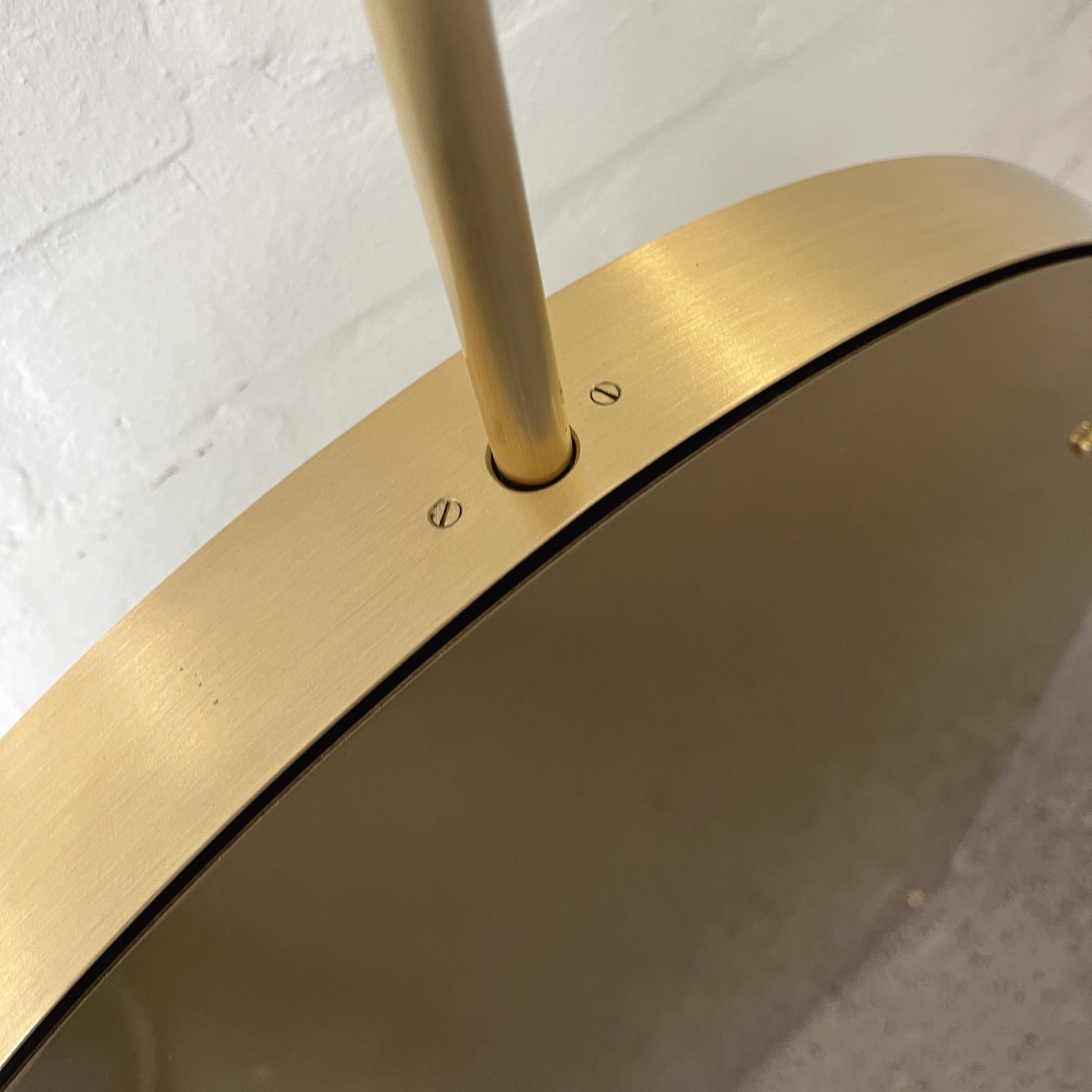 Brushed Arcus Illuminated Ceiling Suspended Arched Contemporary Mirror with Brass Frame For Sale