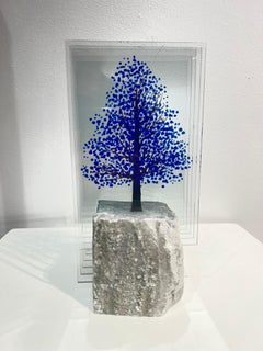 Tree de pin bleu en marbre