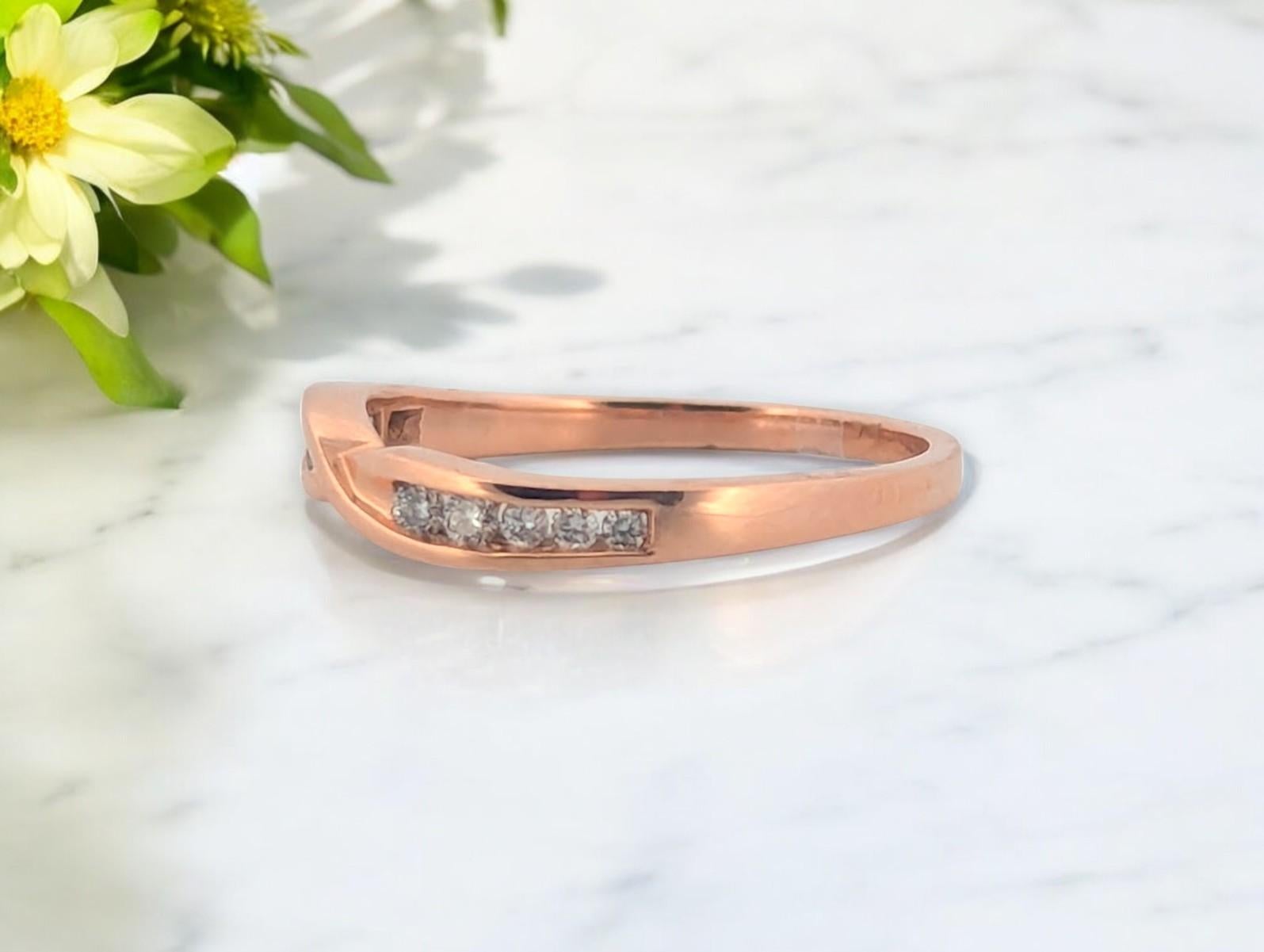 🌸 Timeless Elegance  10K Rose Gold Diamond Ring (0.18 CTW, Size 7.25)

Graceful and delicate, this 10K rose gold diamond ring is designed for those who love minimalist elegance. Featuring 0.18 CTW of natural diamonds, this dainty band makes a