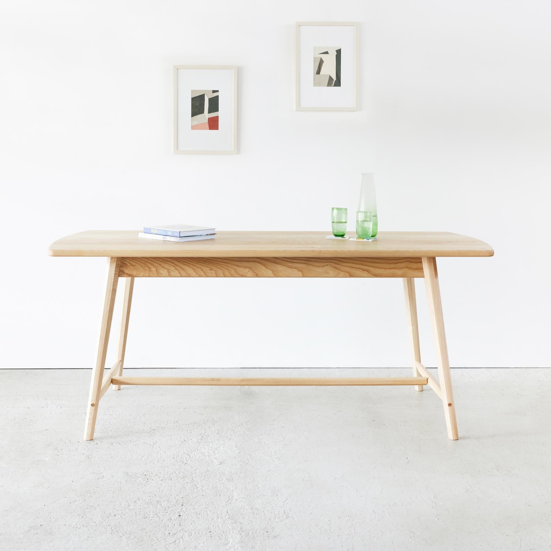 The Arden dining table exudes subtle elegance, with a careful application of traditional joinery. Made using hand-cut exposed wedged tenons, its minimalist structure creates an unobtrusive yet solid piece, perfect for modern, design-led