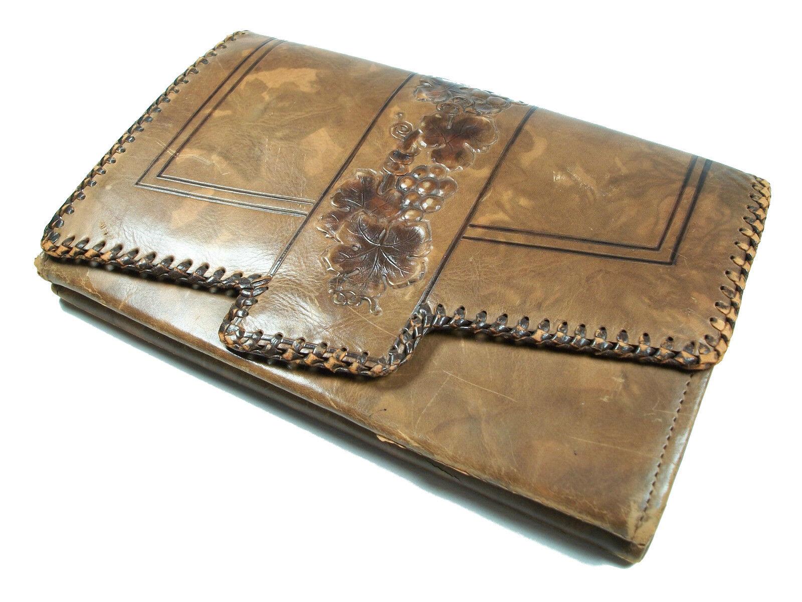 ARDEN FOREST - Vintage embossed leather clutch - handle to the back - whip-stitched flap with press-stud closure - embossed on the front flap with a grape vine pattern - full width open pocket to the back - kid leather interior lining - central