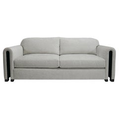 Arden sofa with velvet fabric and opening in arms with inside wood panels