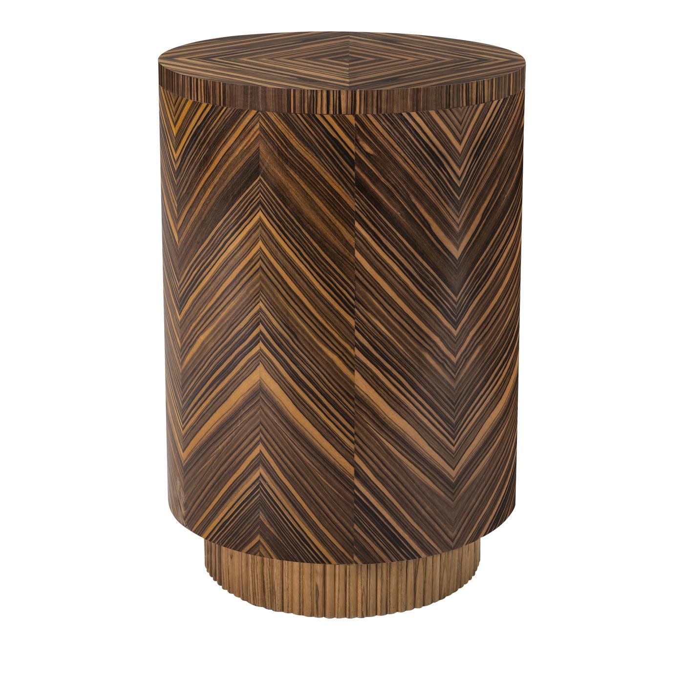 This bedside table features three drawers for ample storage, and its outer perimeter was crafted entirely in ebony Macassar wood with 45 degree crosscut patterns with an almond finish. It also features a zebrawood base that makes a striking