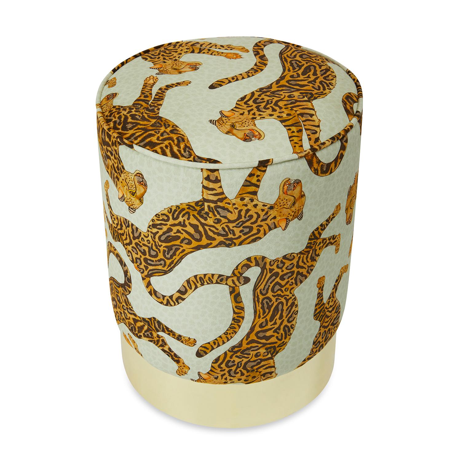 A luxurious Cheetah Kings gold velvet fabric covered Pouff with a brass base.

Product information
DIMENSIONS: 15