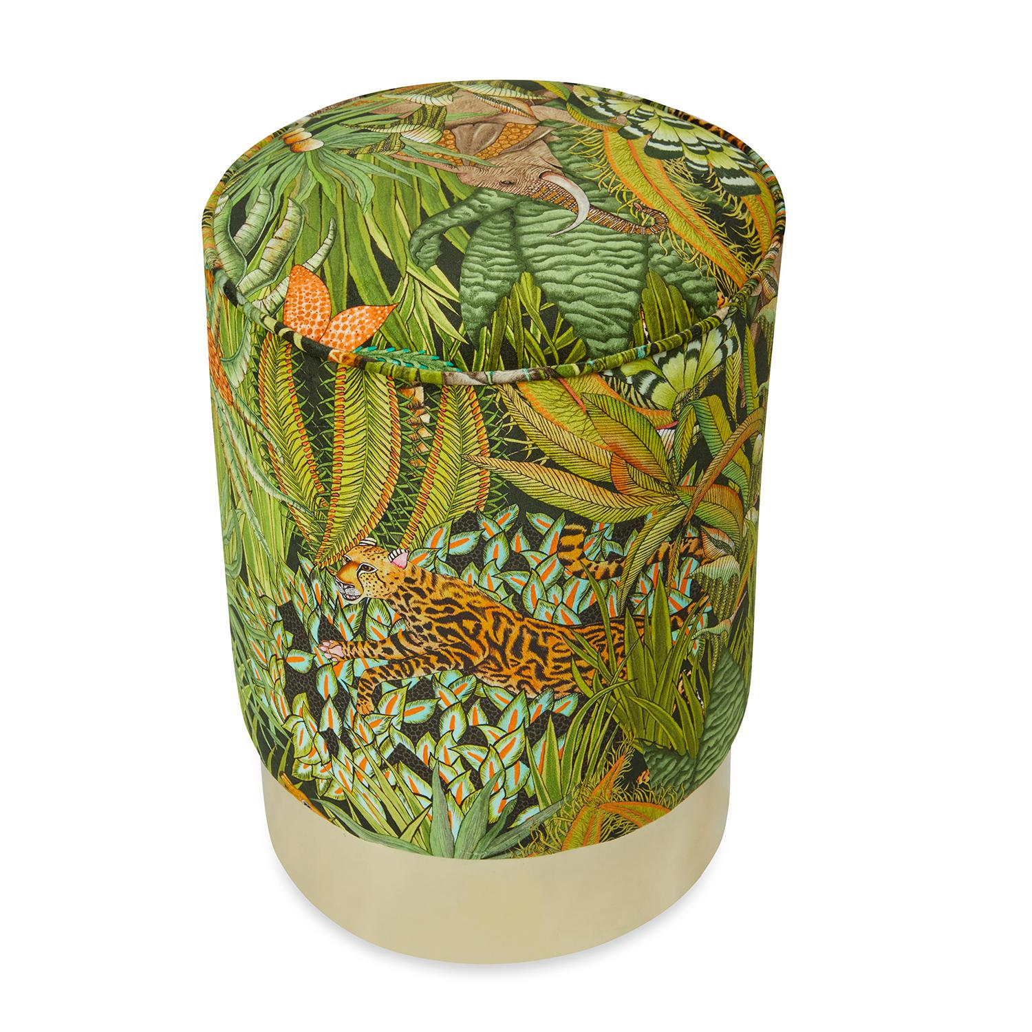 This ottoman's velvet upholstery, inspired by the fauna and flora of South Africa's Kruger National Park, sits atop a gleaming golden base. Ample high-density foam fill ensures long-lasting comfort whether you're using the pouf as a seat or a