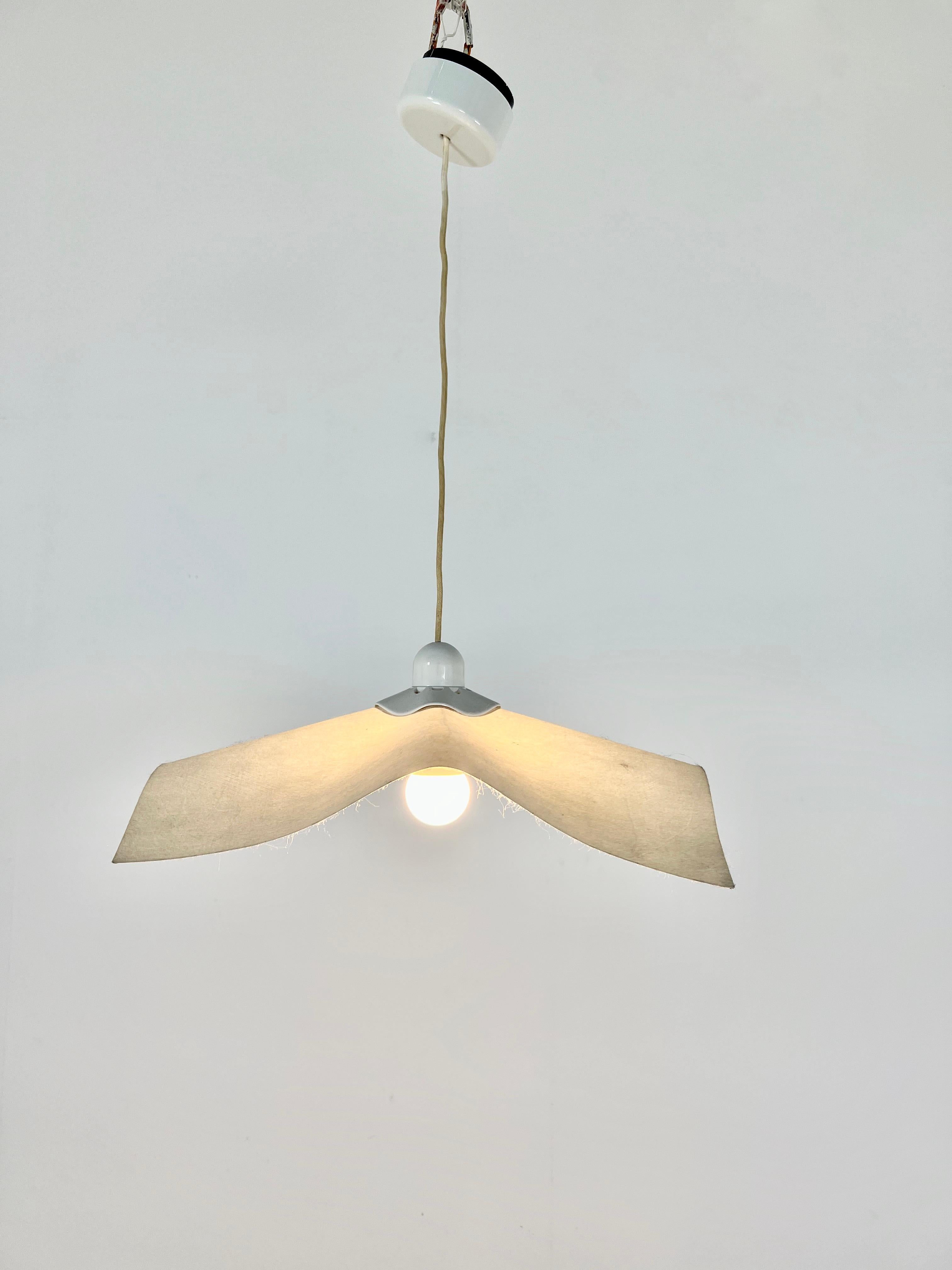 Paper chandelier. Wear due to time and age of the chandelier.