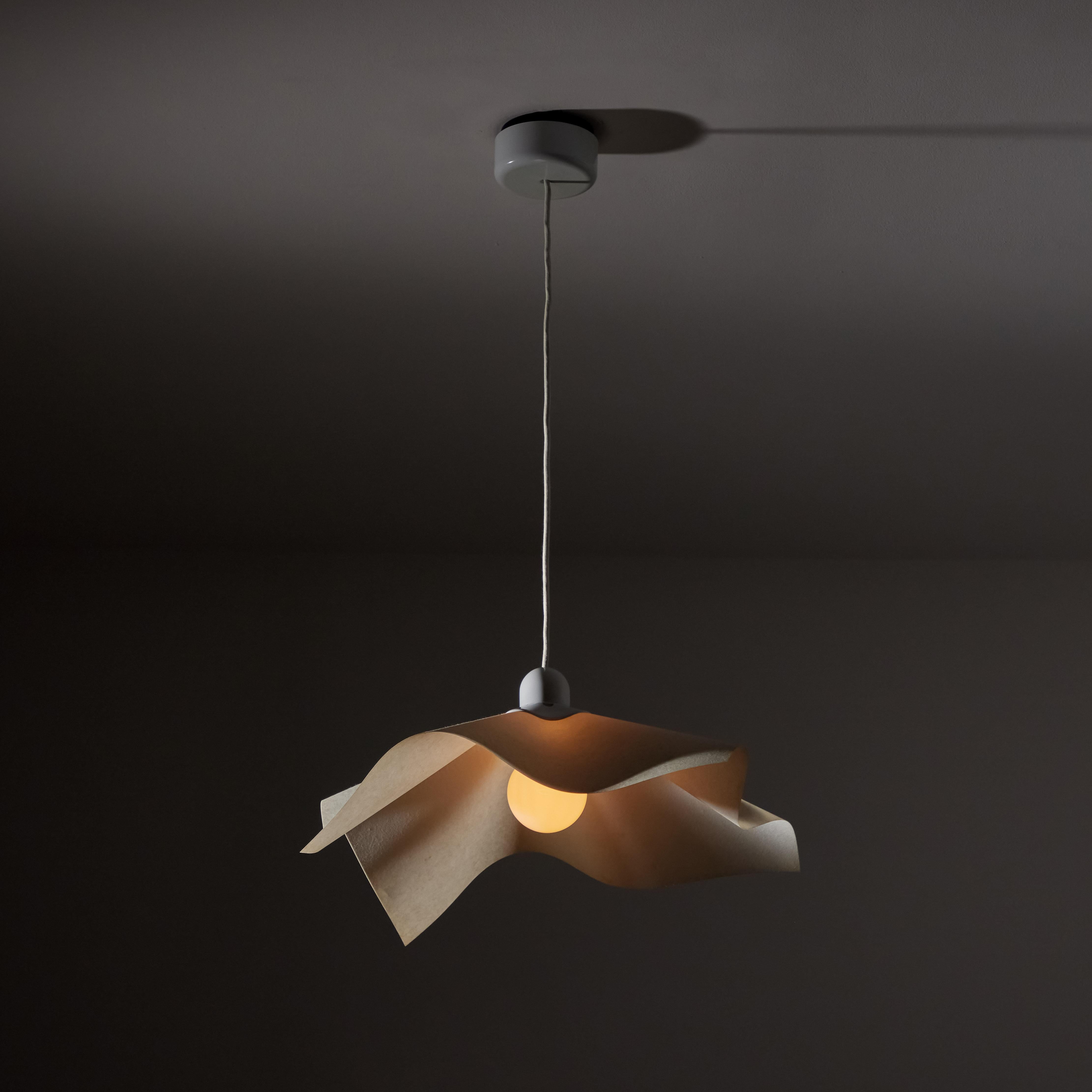 Area Curvea ceiling light by Mario Bellini & Giorgio Origlia for Artemide. Designed and manufactured in Italy, 1974. Steel, acrylic, with resin shade. Original cord, wired for U.S. standards. We recommend one E27 60w maximum bulb. Bulb not included.