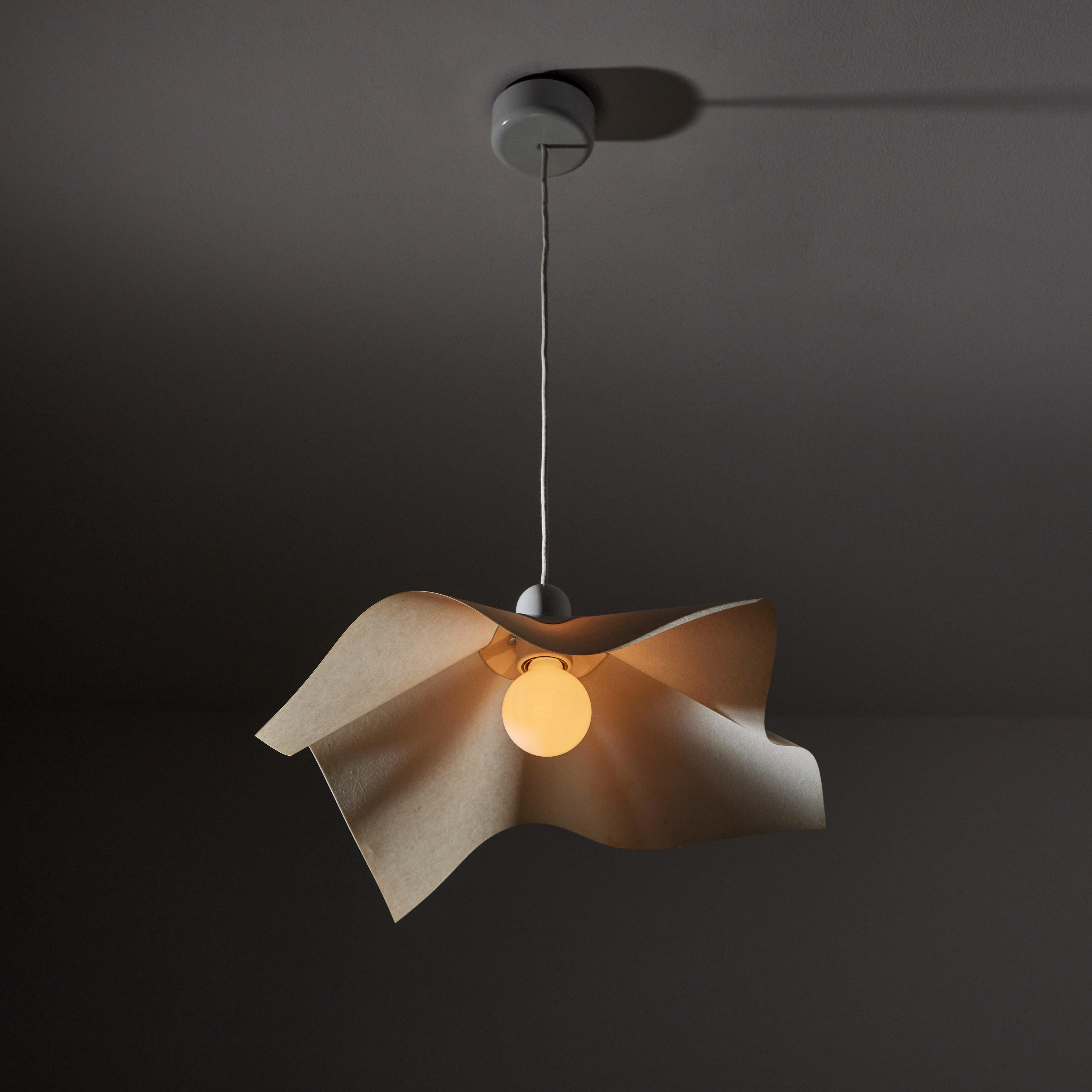 Area Curvea ceiling light by Mario Bellini & Giorgio Origlia for Artemide. Designed and manufactured in Italy, 1974. Steel, acrylic, with resin shade. Original cord, wired for U.S. standards. We recommend one E27 60w maximum bulb. Bulb not included.