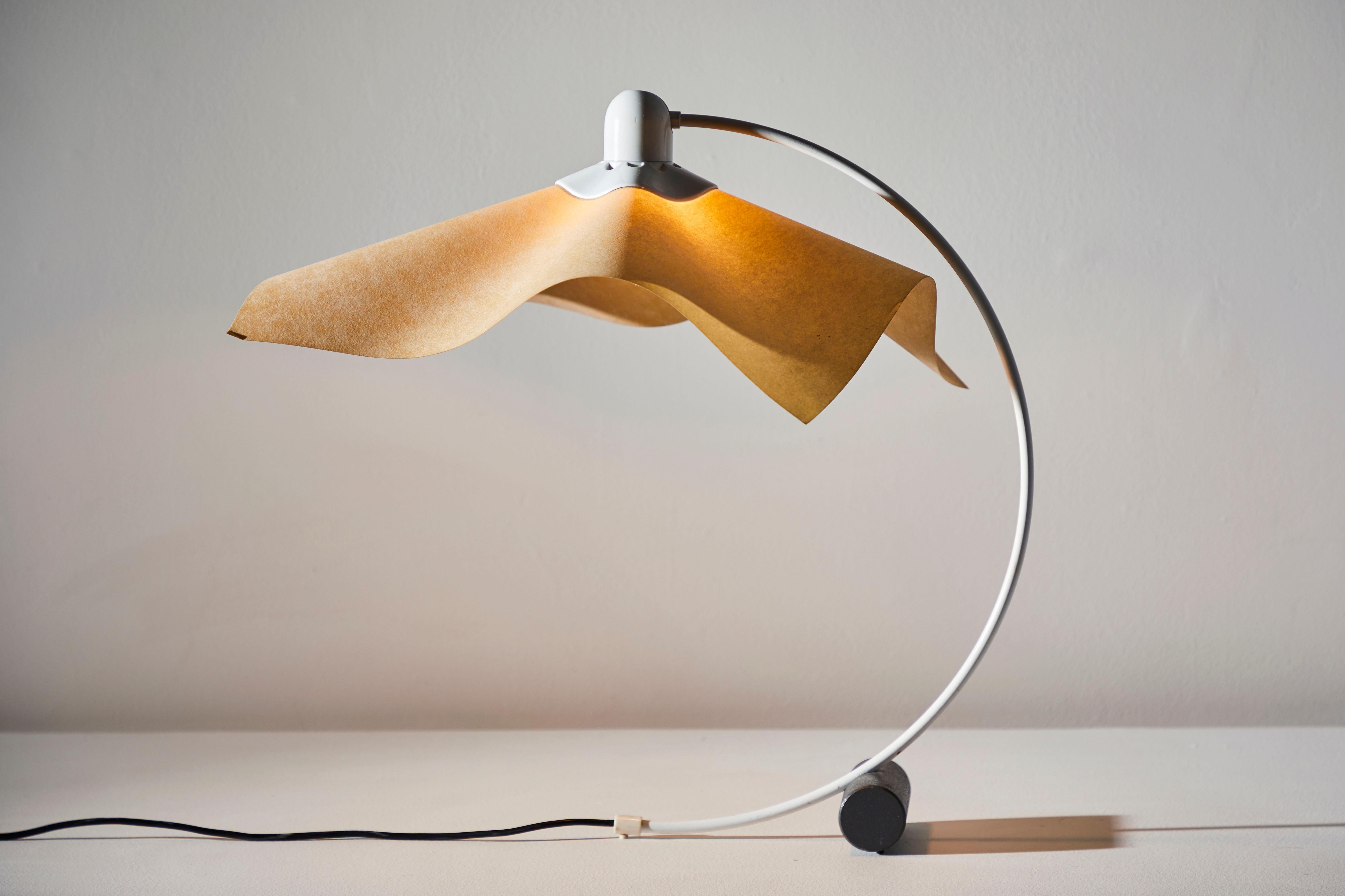 Area Curvea table lamp by Mario Bellini & Giorgio Origlia for Artemide. Designed and manufactured in Italy, circa 1974. Steel, acrylic, with resin shade. Original cord wired for U.S. sockets. Takes one E27 60W maximum bulb.