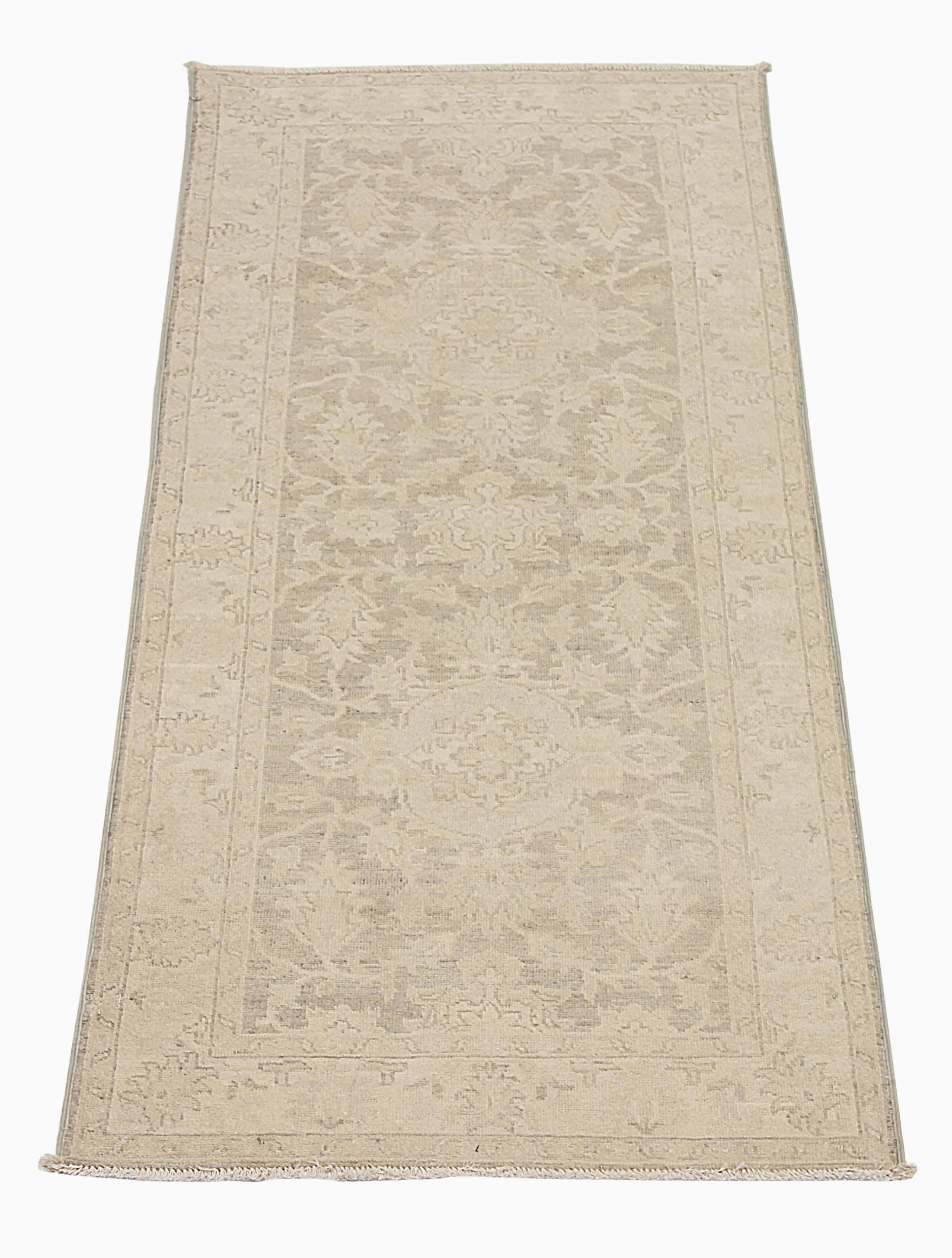 Transform your living space with this stunning, handwoven area rug. Made from the finest sheep's wool and colored with eco-friendly, all-natural vegetable dyes, this rug is a beautiful and responsible addition to your home.

Boasting the classic