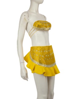 Ensemble haut et mini-jupe orné de jaune taille XS