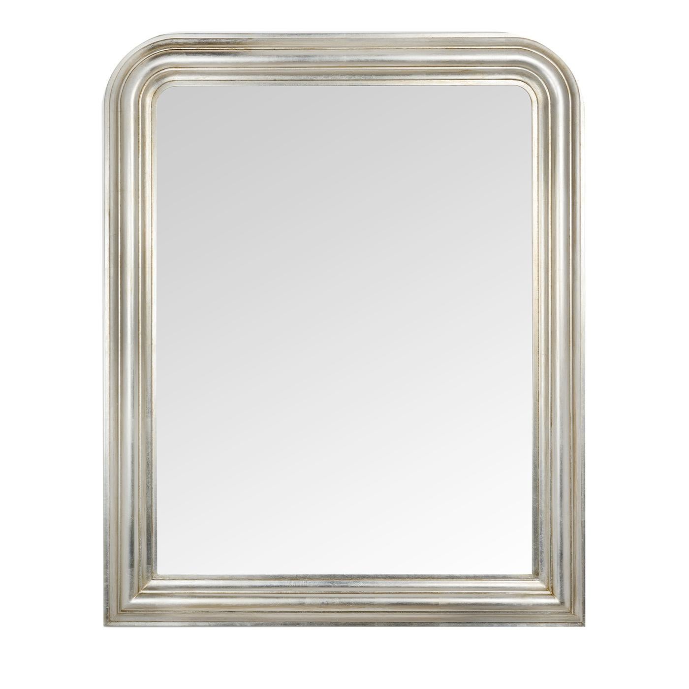 A flawless synthesis of elegance and opulence distinguishes this sublime wall mirror, design minutely handcrafted borrowing traits in precious Louis Philippe style. Clean lines in a fresh combination of right and rounded corners mark the wooden