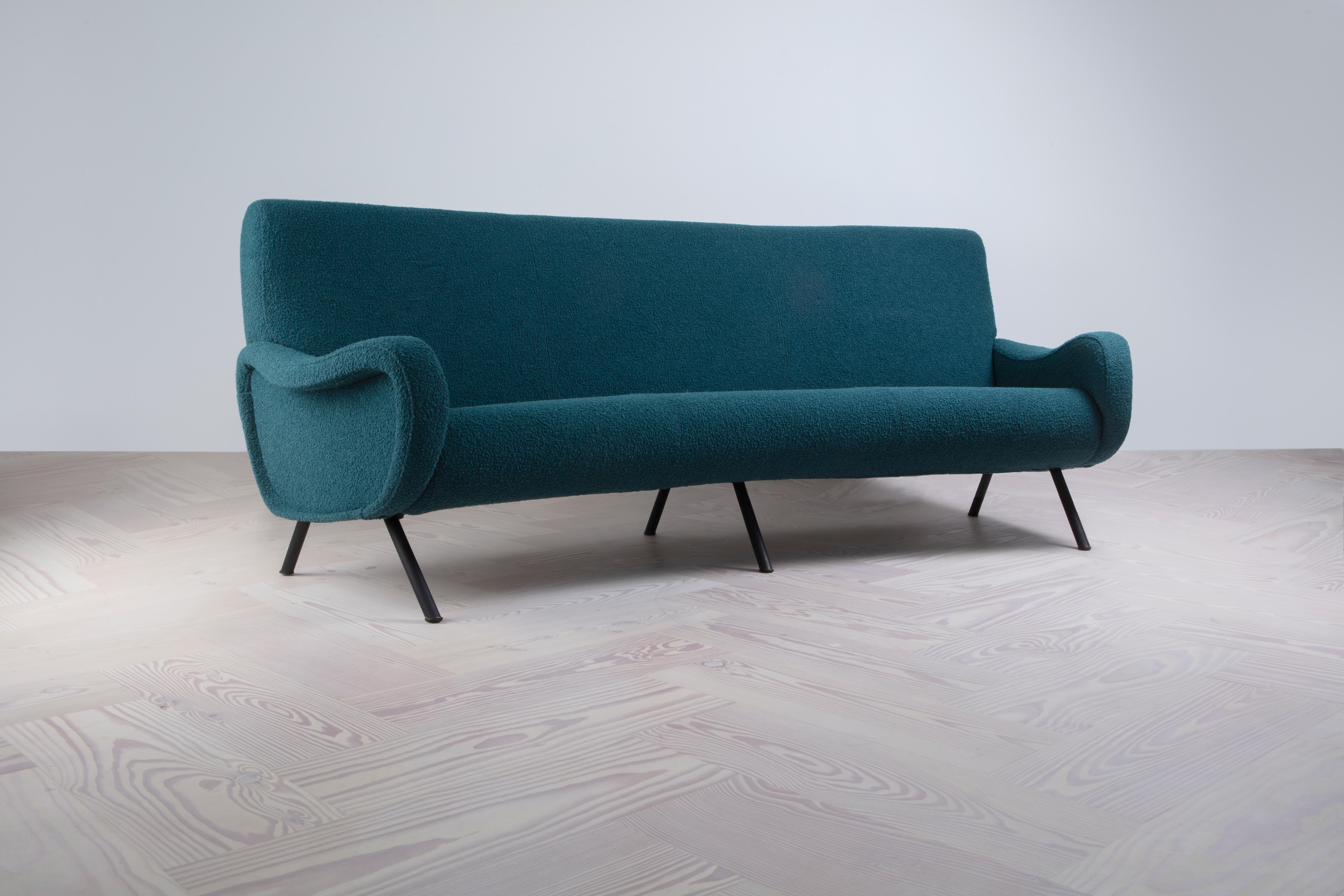 An original midcentury Arflex 3 seater Lady sofa, designed by Marco Zanuso in the 1950's 

This sofa has been lovingly reupholstered by an expert master-craftsman in Tuscany using Peacock Ismay Boucle.
 