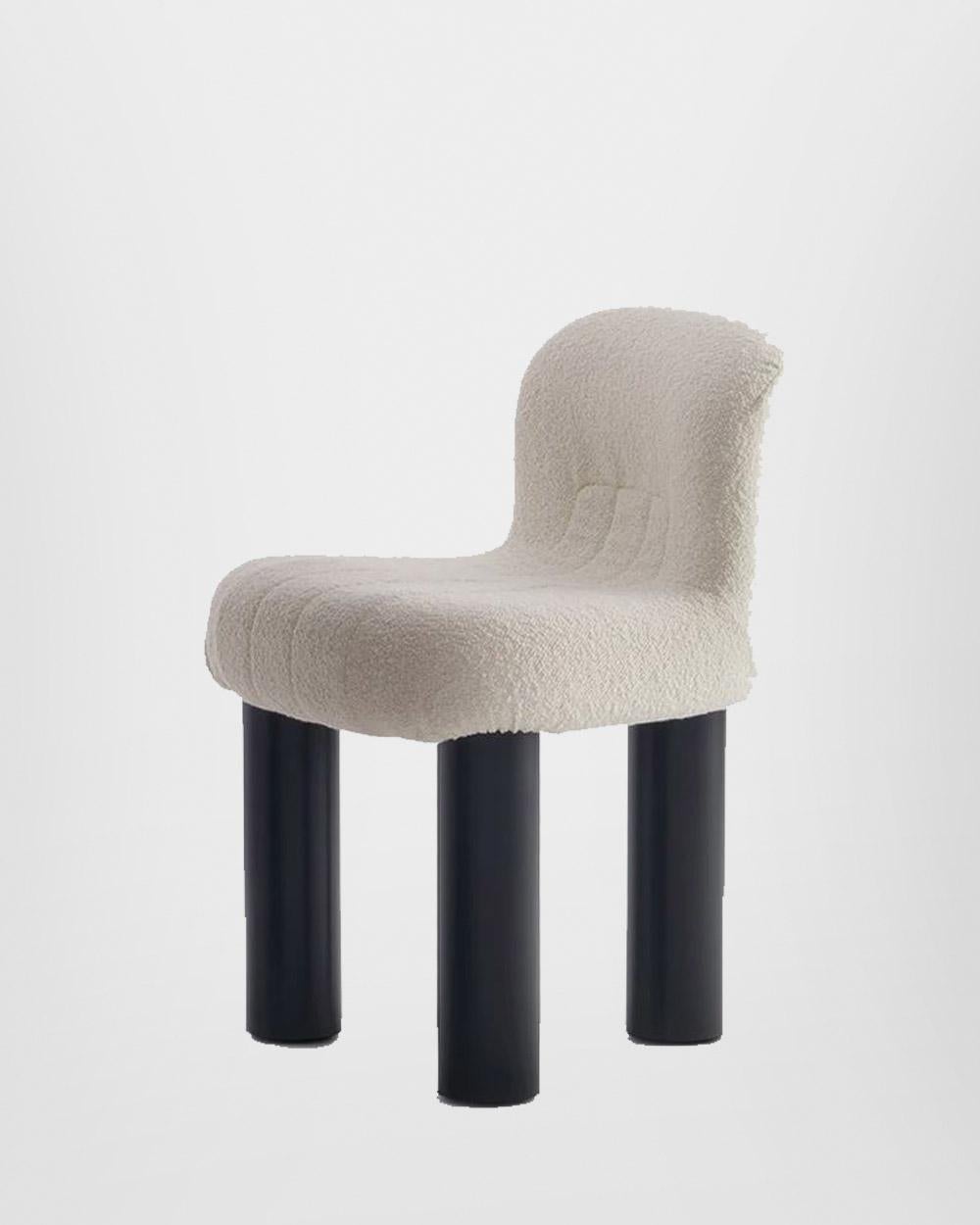 Botolo Chair is designed by Cini Boeri for Arflex. An innovative upholstered rolling chair with three large tubular legs. Botolo is an ideal place to sit, relax and be creative. Cini Boeri designed Botolo in 1973, giving life to a new design style,