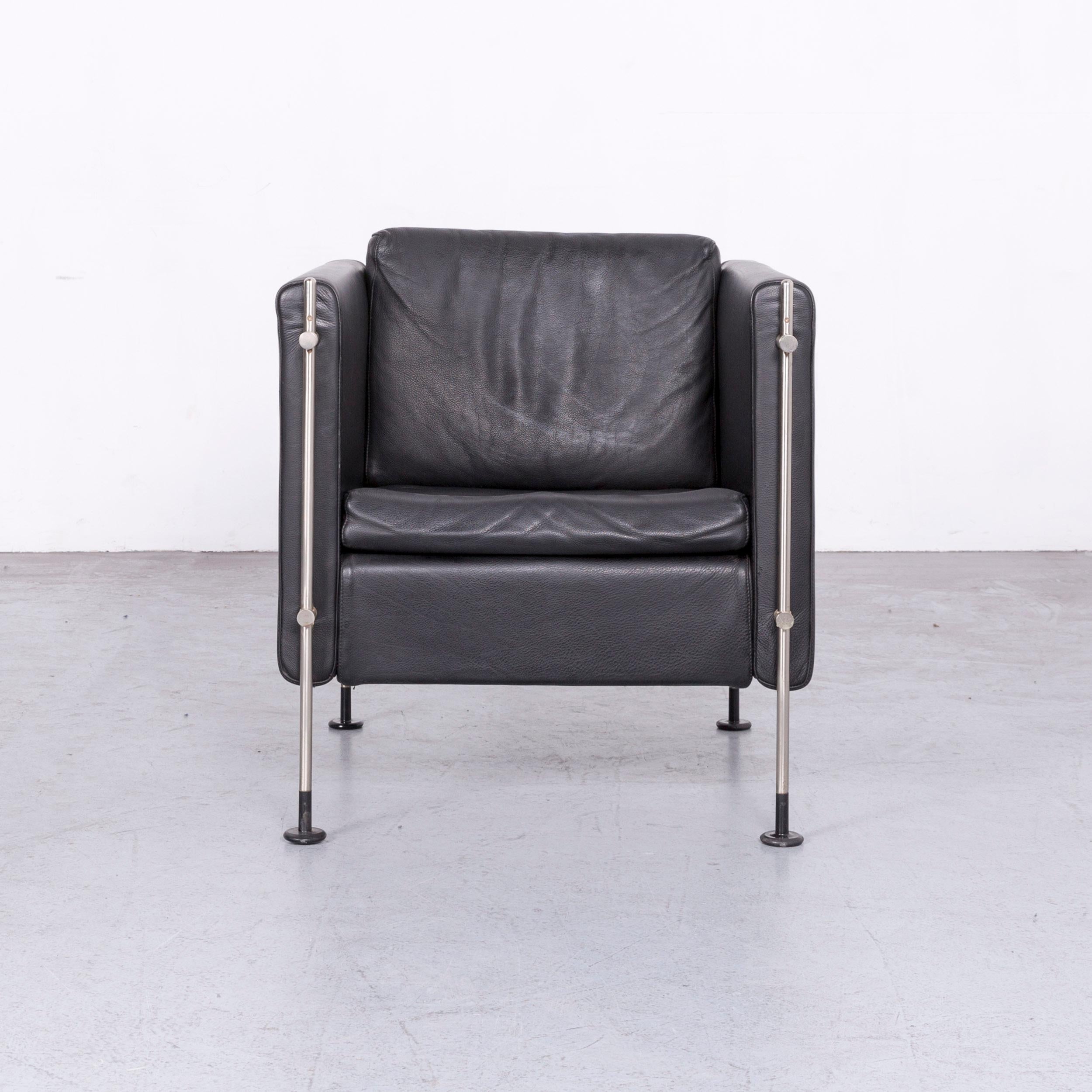We bring to you a Arflex Felix leather armchair black one-seat chair.

































