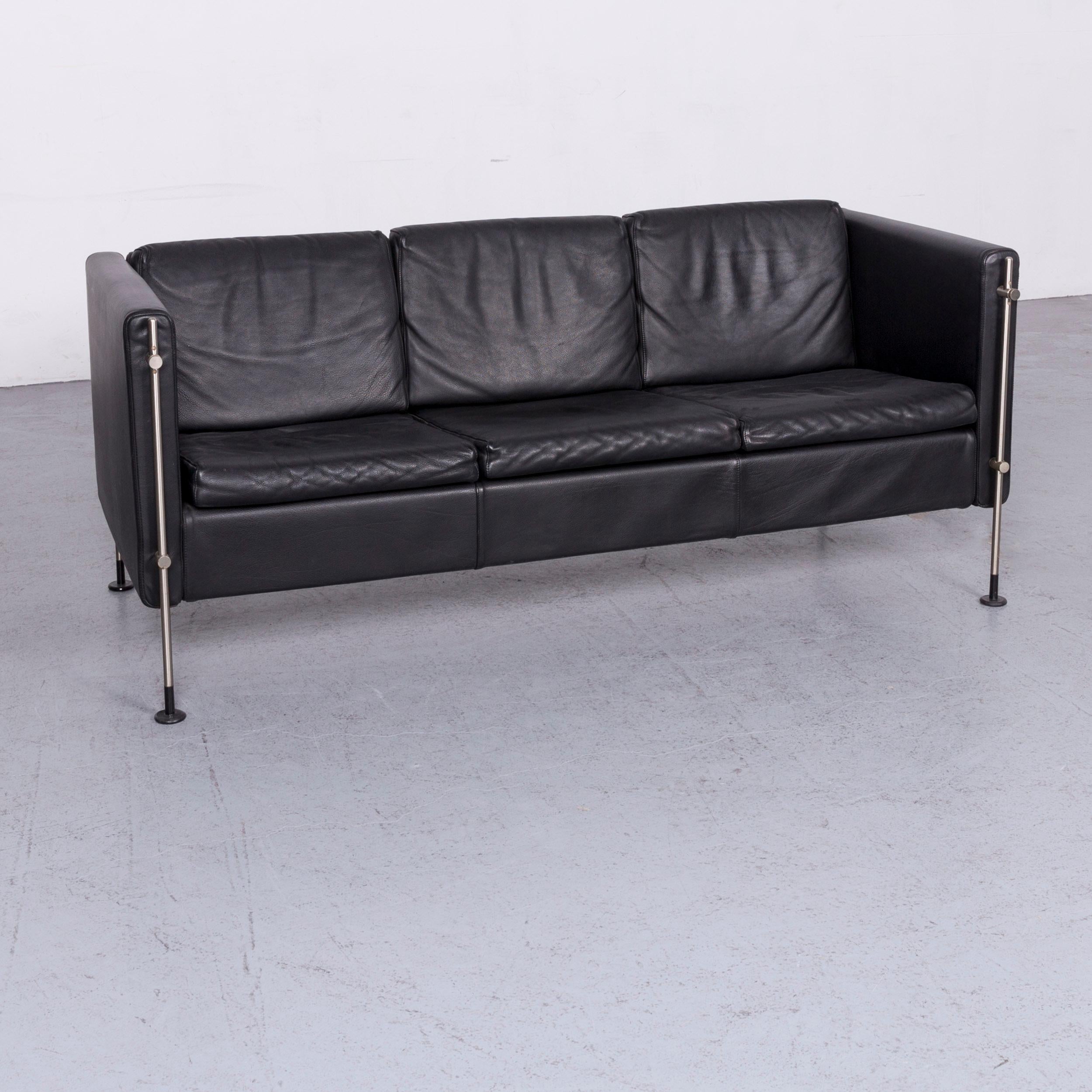 We bring to you a Arflex Felix leather sofa black three-seat chair.


































