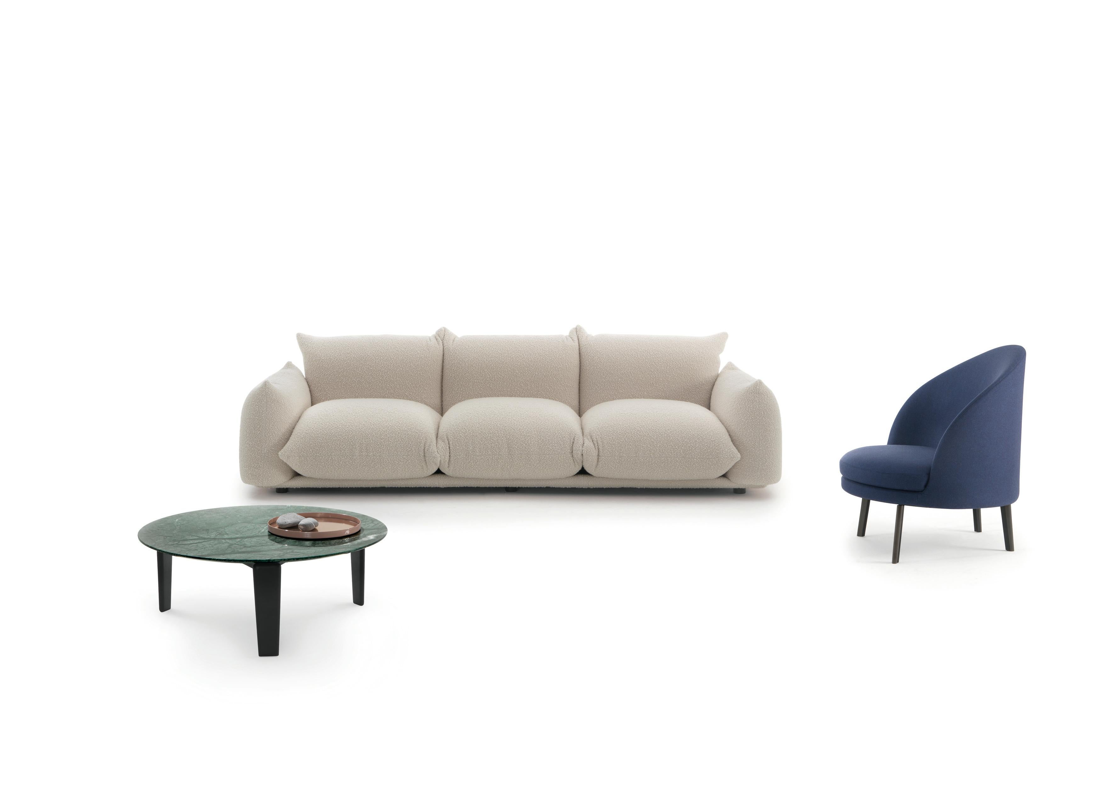 Marenco Sofa is designed by Mario Marenco for Arflex. This sofa features the system with making the armrest and seat as the base portion. There is a metal tubular frame facilitated for accommodating the cushions which provide firm and rigidity to