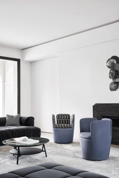 Arflex Mojo Poltrona in tessuto verde acqua con base girevole di Claesson Koivisto Rune