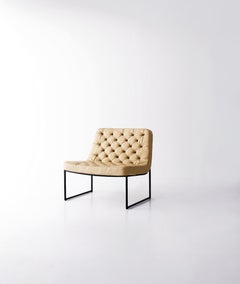 Arflex Sella Armchair in Leather with Black Metal Base