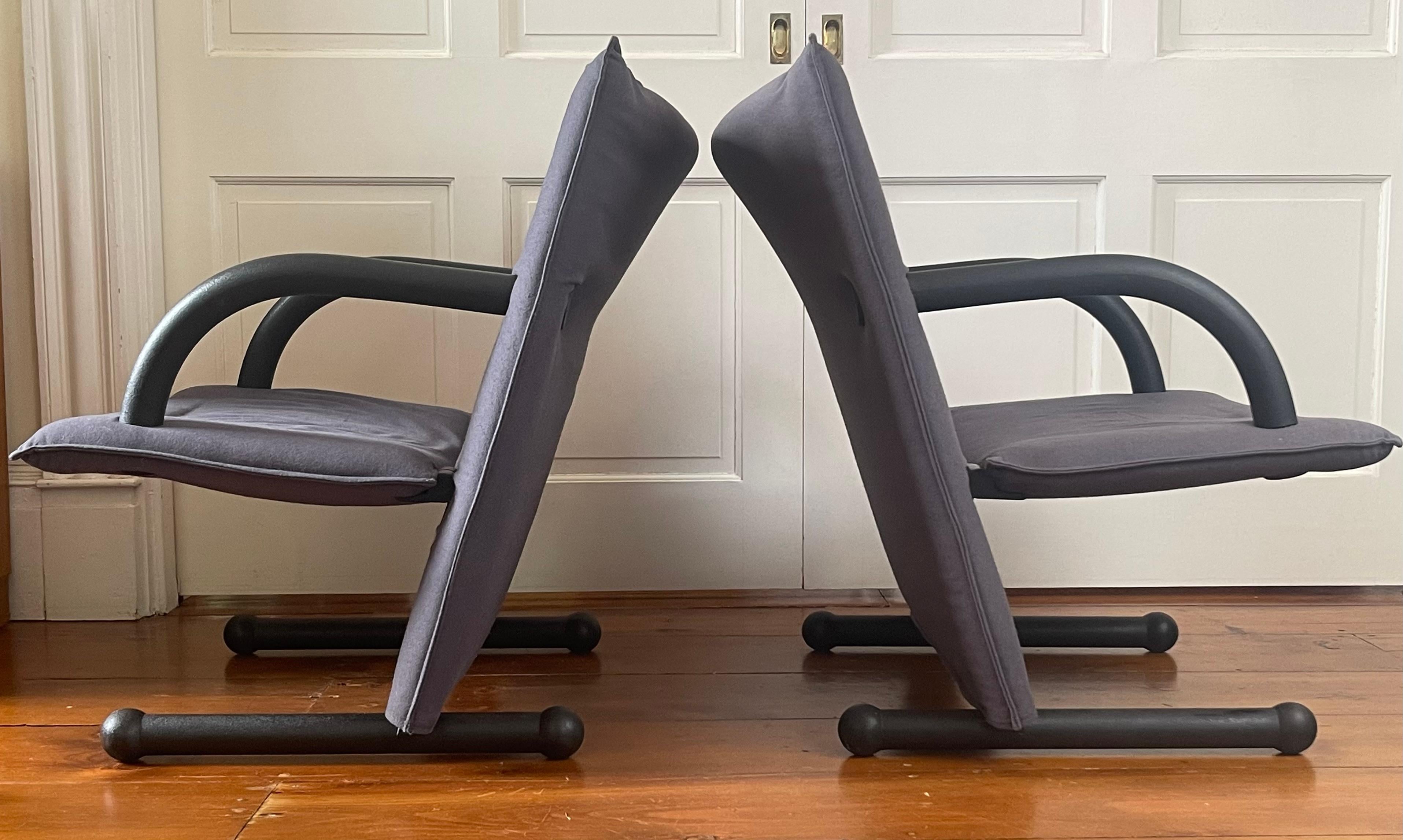 Fabulous pair of T-line chairs designed by Burkhard Vogtherr for Arflex, Italy, 1984. Four sets currently in inventory. Please note each chair has a greater or lesser degree of staining and/or damage to the original fabric, so these are priced to