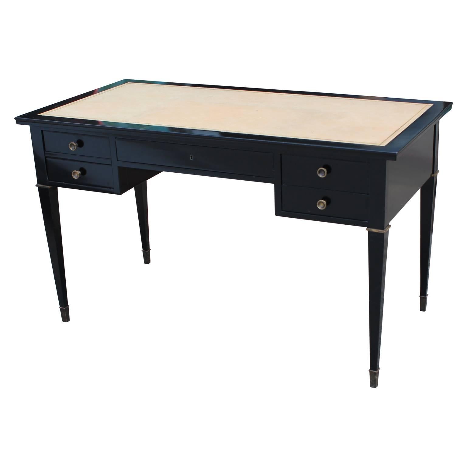Maison Jansen style desk made in Argentina with a nice leather top. Piece was made with black lacquer and has nice brass handles.