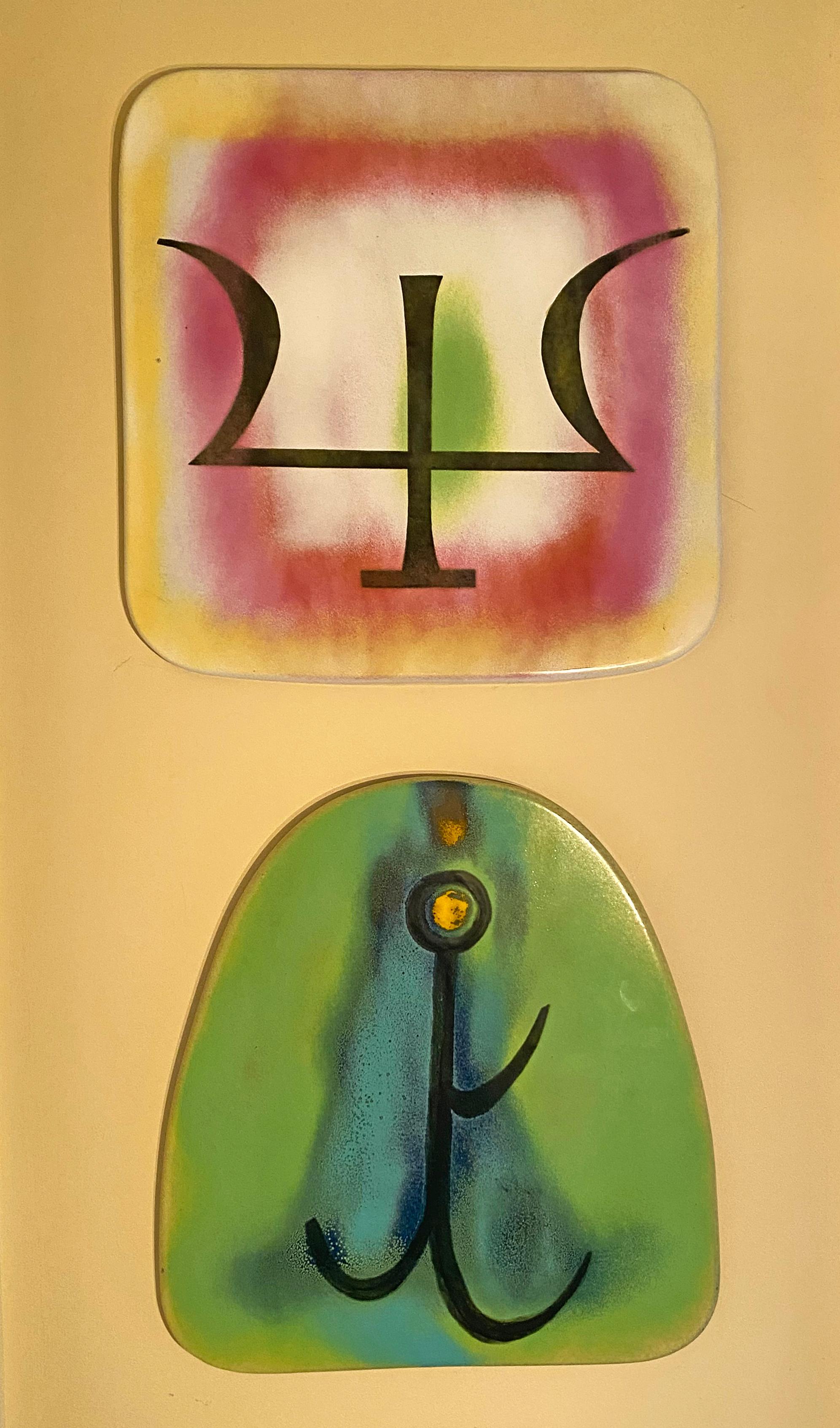 Fabulous set of four metal enamel Argentinian cattle brand symbols on wall plaques that once hung in the Gaucho Bar in NYC. Bright colors and designs suggest a Miro like whimsy. Fun for a bar or other room in the house. Found Vintage Art at its