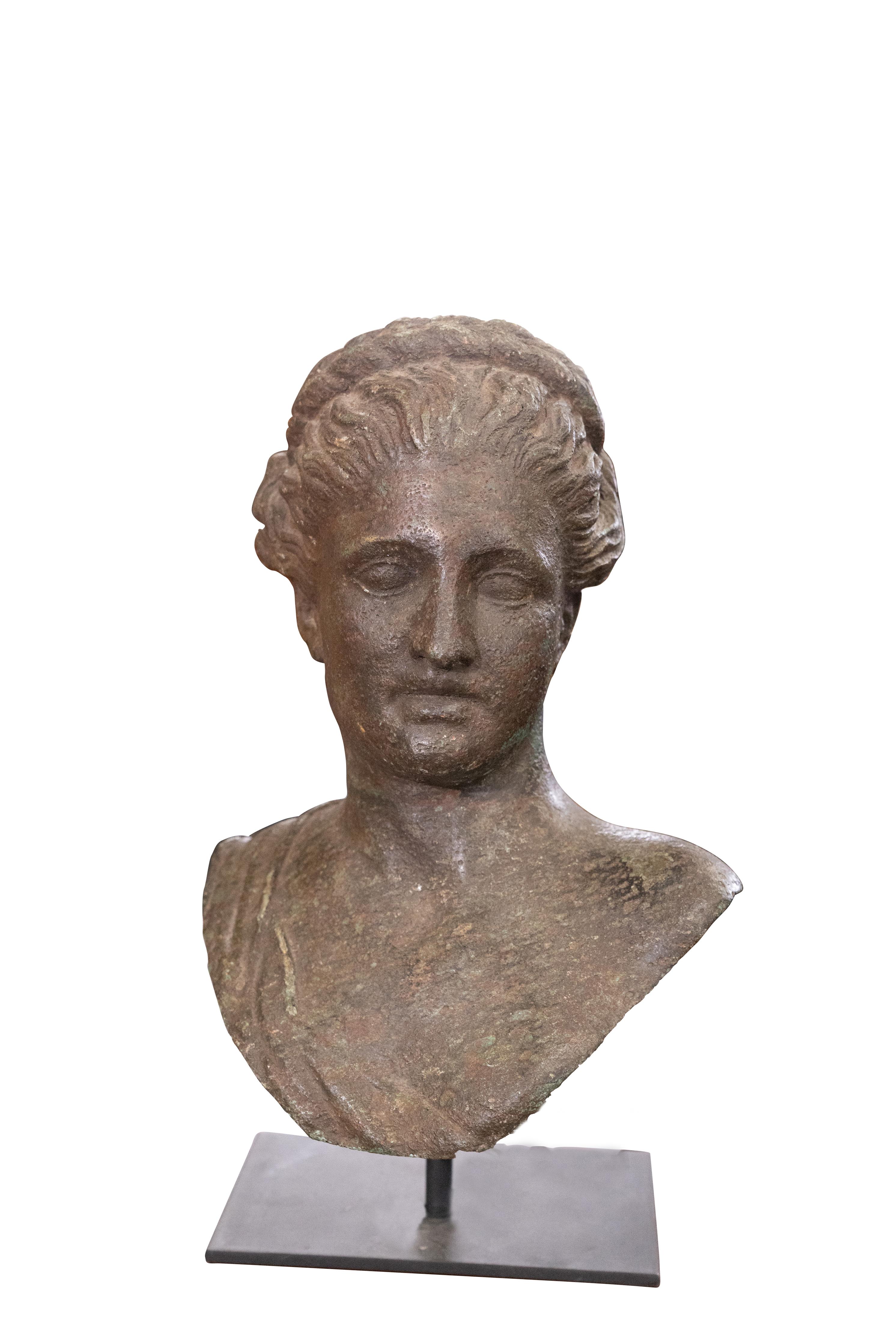 Argentinian Iron Bust of a maiden with custom made metal base. Circa 1900.

Base: 8