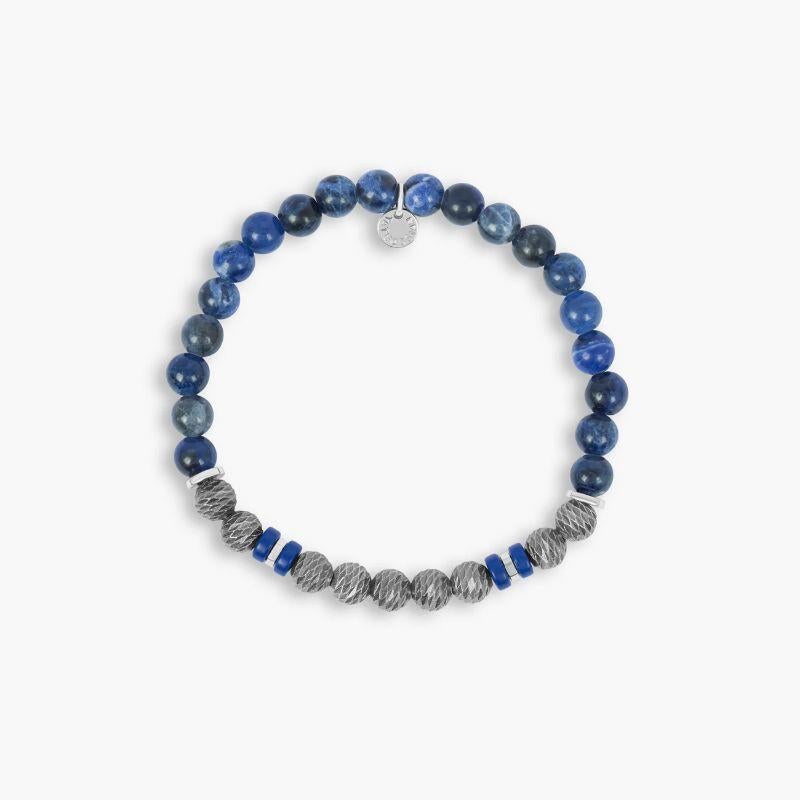 Pulsera Argento Graffiato y Sodalita de Plata de Ley Rodiada, Talla L

Nuestra última versión de la clásica pulsera de cuentas, este estilo consiste en cuentas de plata texturizadas compensadas con cuentas redondas y discos de ágata negra. Cada
