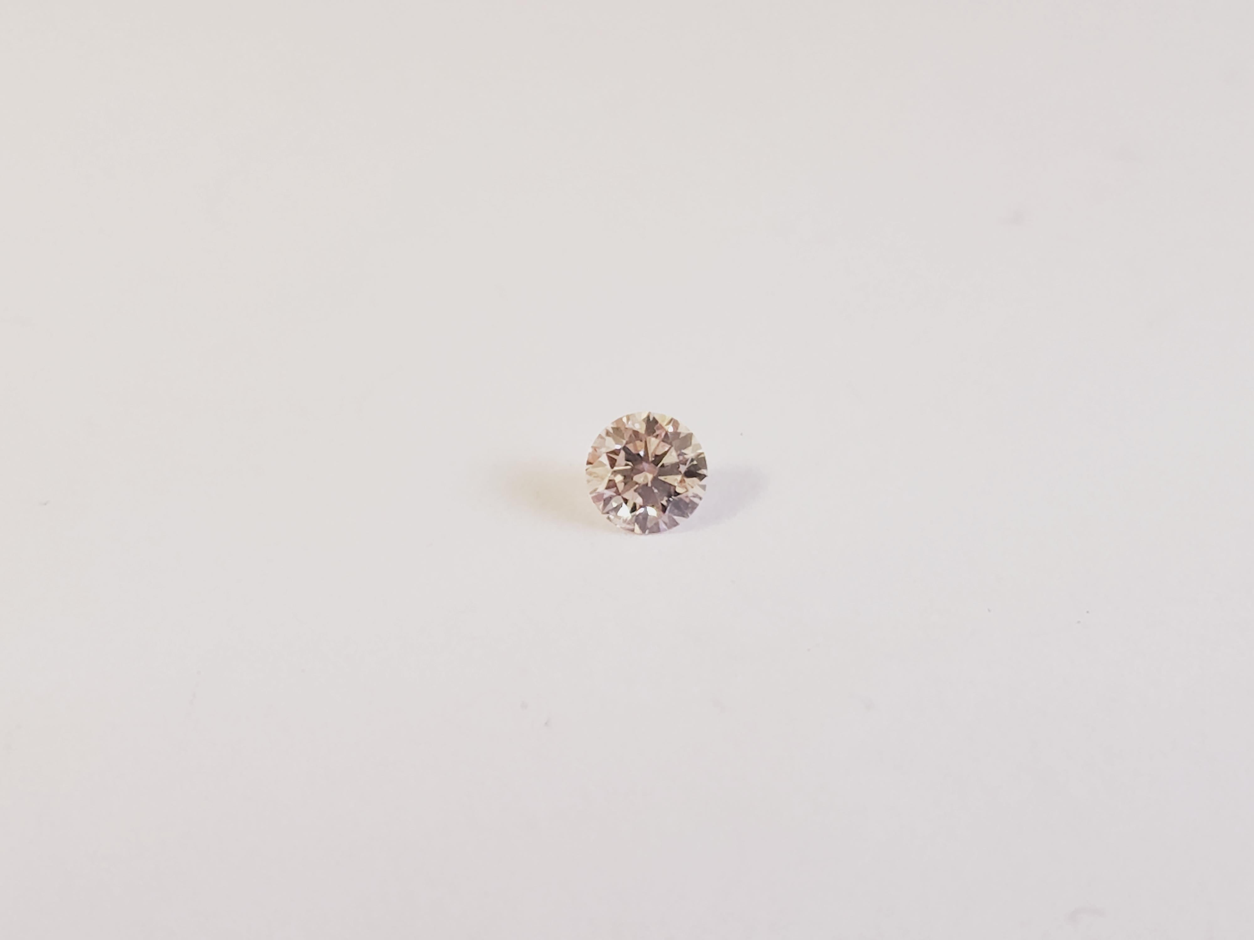 Argyle 0.12 Carat Natural Pink Champagne Round Shape Loose Diamond. Argyle with inscription on the diamond.

2020: Closure of the Argyle mine On 3 November 2020, mining at Argyle officially stopped after 37 years of operations.
It's a great