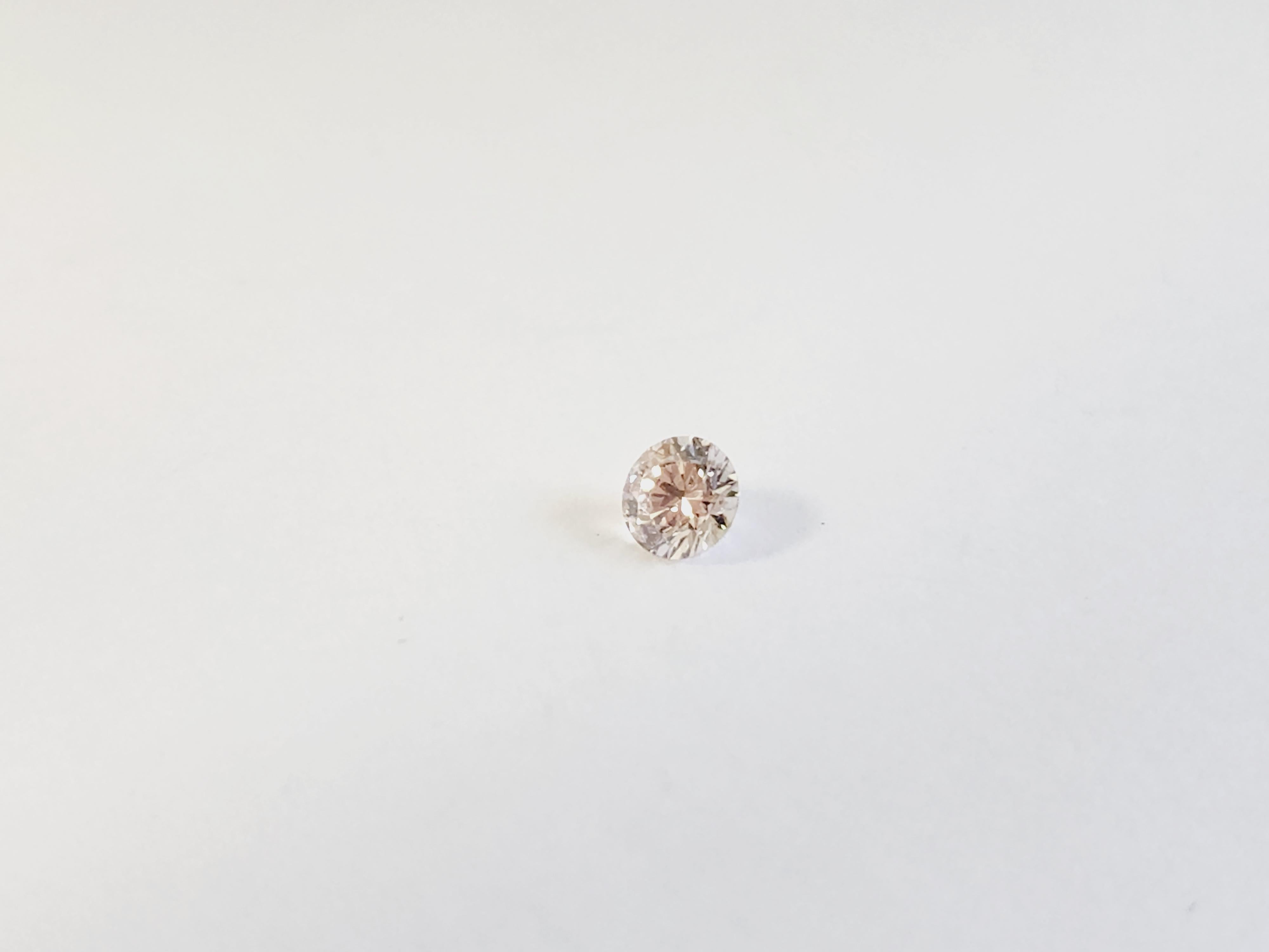 Argyle 0,12 Karat natürlicher rosa Champagner-Diamant in runder Form in Loser Diamant (Rundschliff) im Angebot