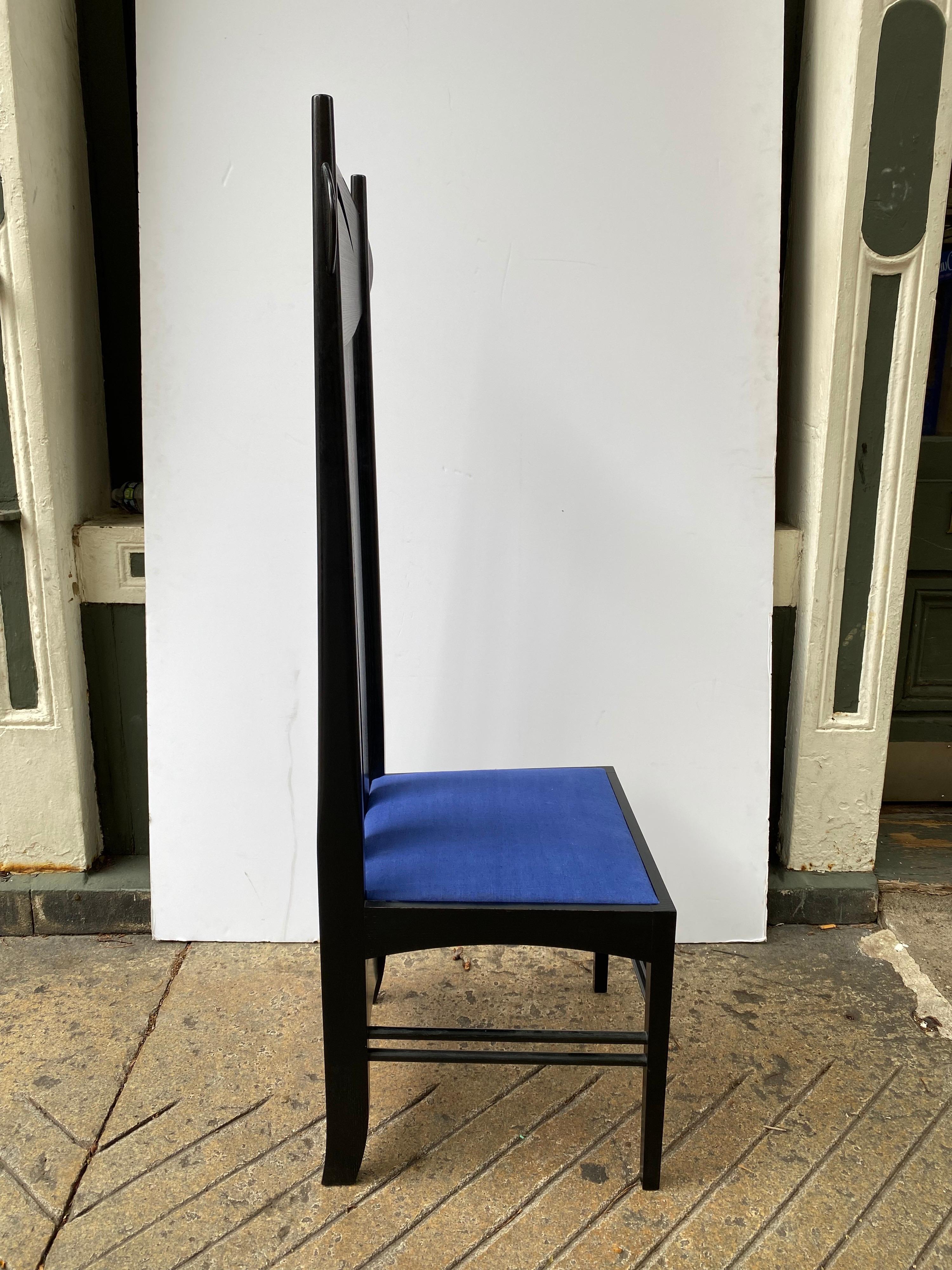 Argyle chair by Charles Rennie Mackintosh. Produced under License agreement by Cassina Italy. Nice Clean example in very nice shape. Original blue fabric seat pad is very nice. Signed and numbered to inside of seat.