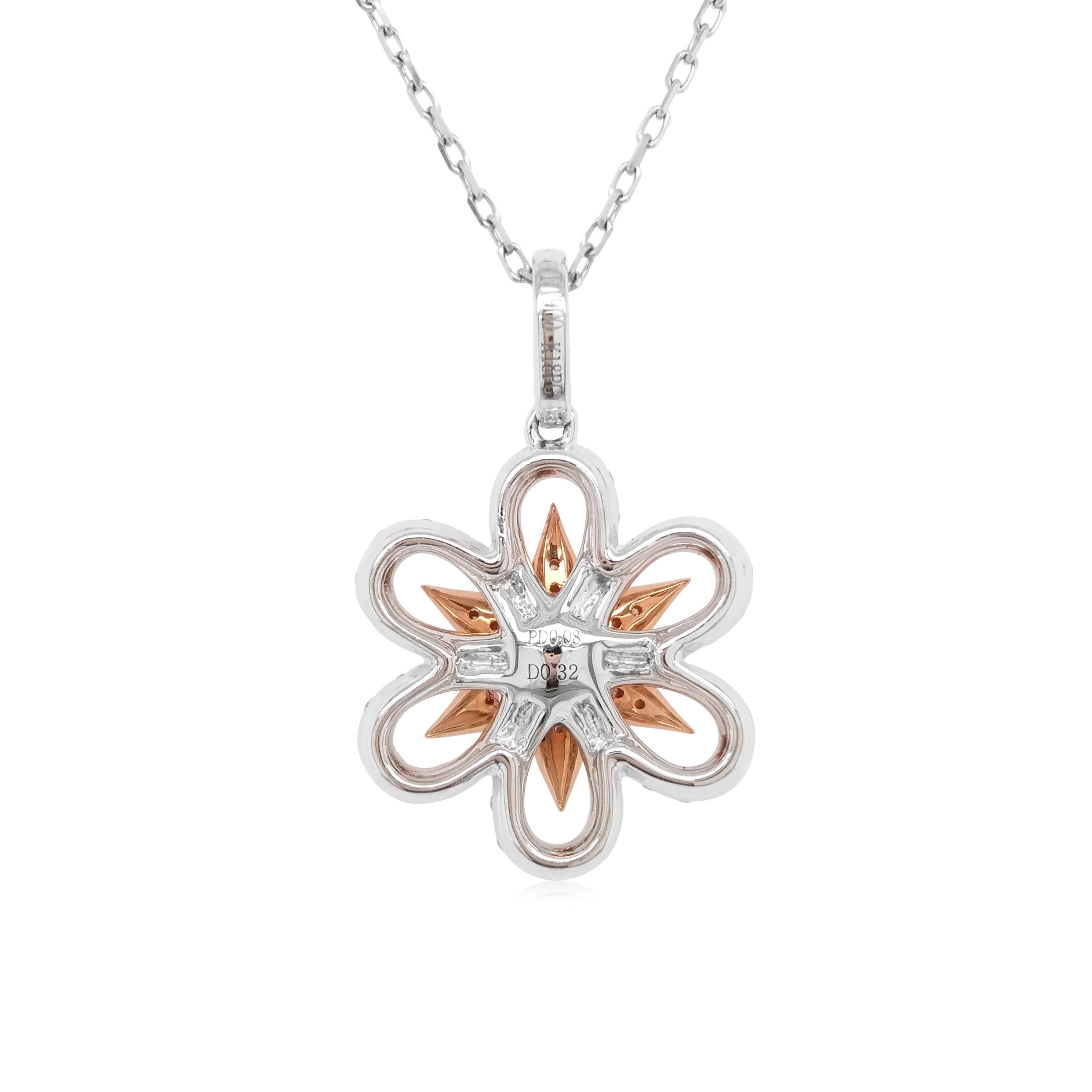 This mesmeric platinum pendant features natural Argyle pink diamonds at its forefront, accentuated by the white diamonds floral motif which surrounds it. Bold, yet intricate, this one-of-a-kind pendant will add a sumptuous touch of colour to your