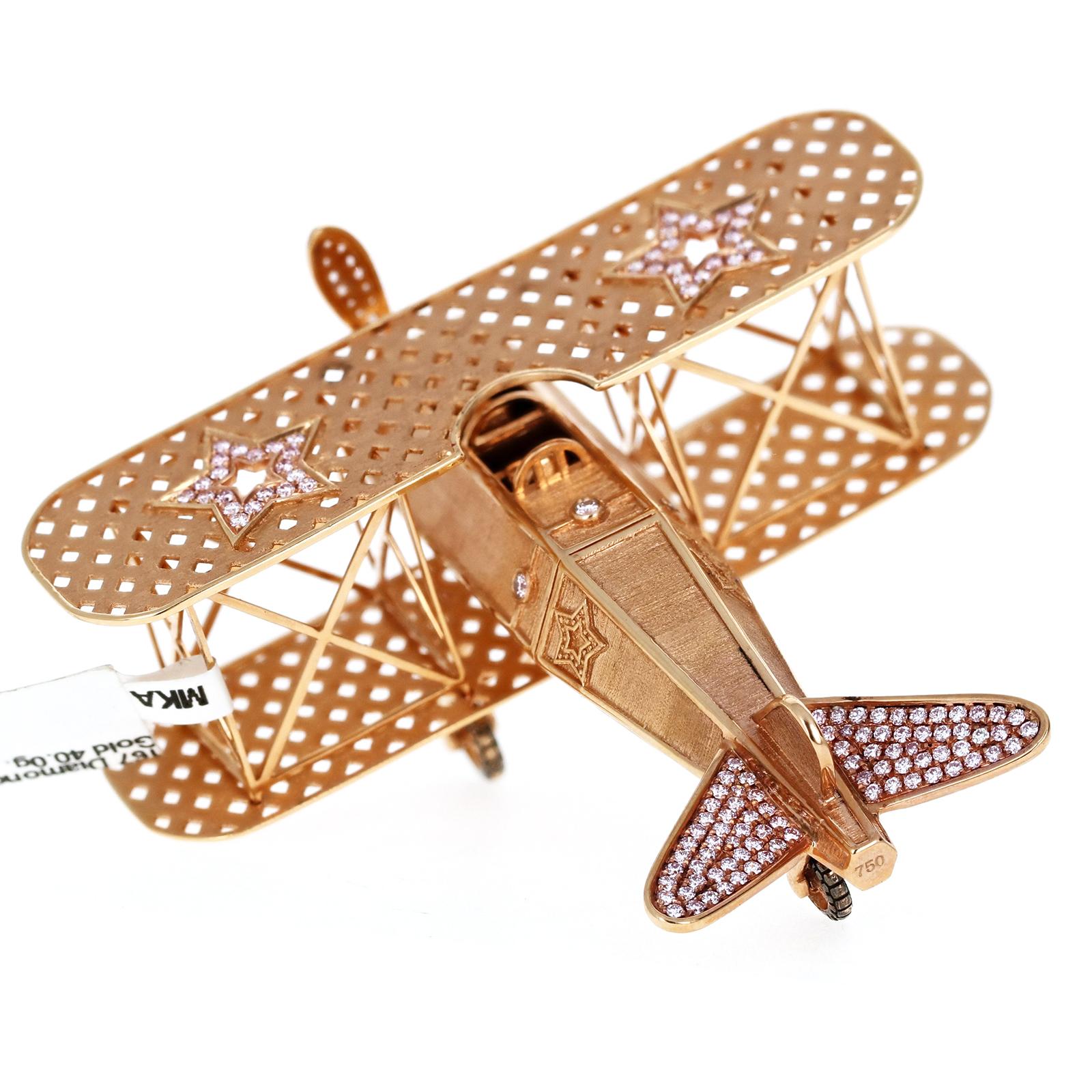 A one-of-a-kind, unique collector's piece made of solid 18-karat rose gold and natural pink diamonds. This Objets d'Art and Vertu has a propeller that spins and wheels that move.
The intricate detail and originality are not only unique but very