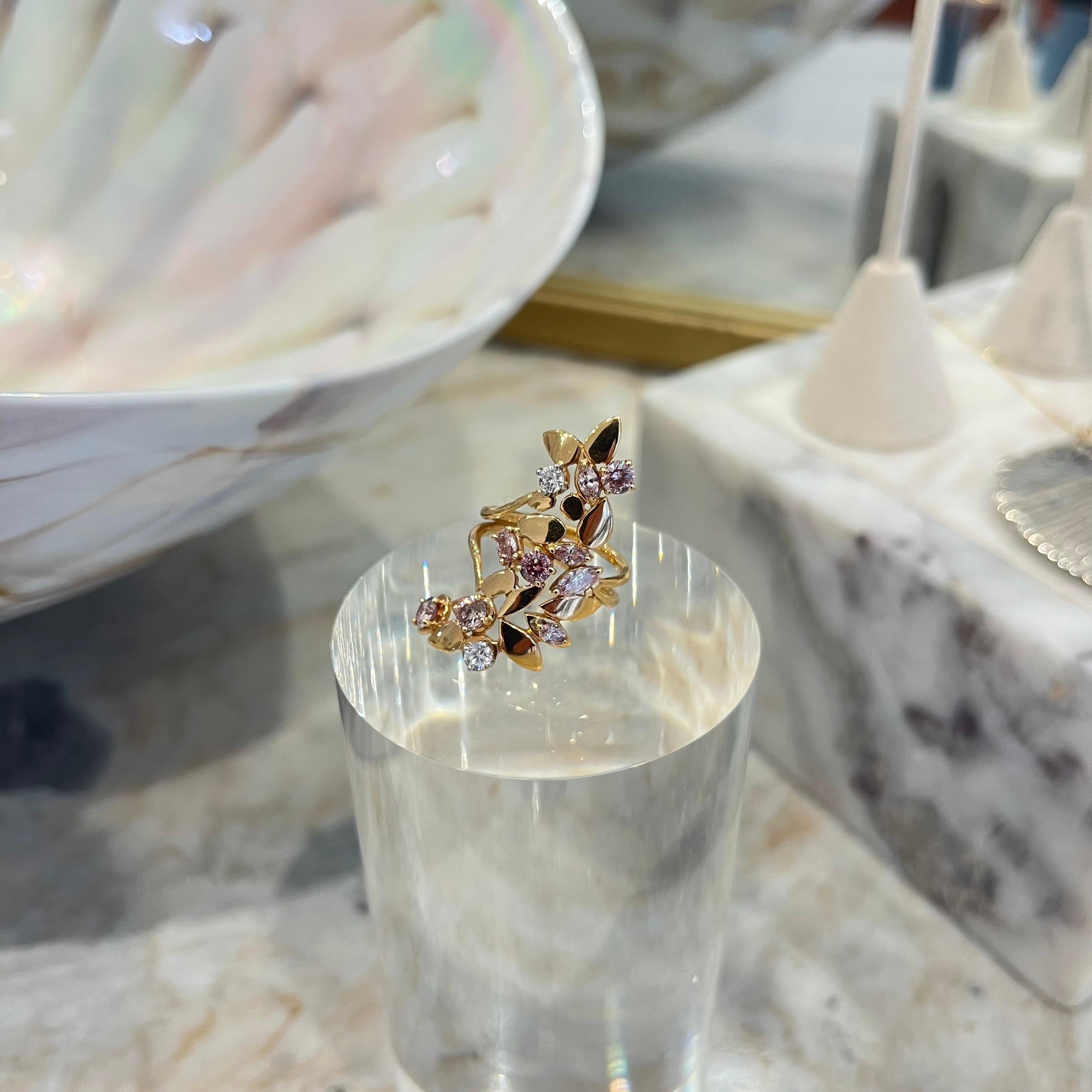 Argyle Pink Diamonds 18k Gold Ring Leaf Design. Argyle diamonds are the most sought after and rare pink diamonds in the world. Treasured for their beauty, these majestic diamonds clustered here in a floral bouquet of these brilliant stones set in