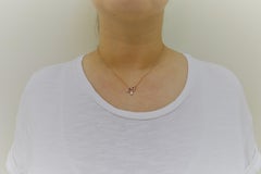 Argyle Pink Diamonds and White Pear Shape Diamonds Bow Pendant Necklace