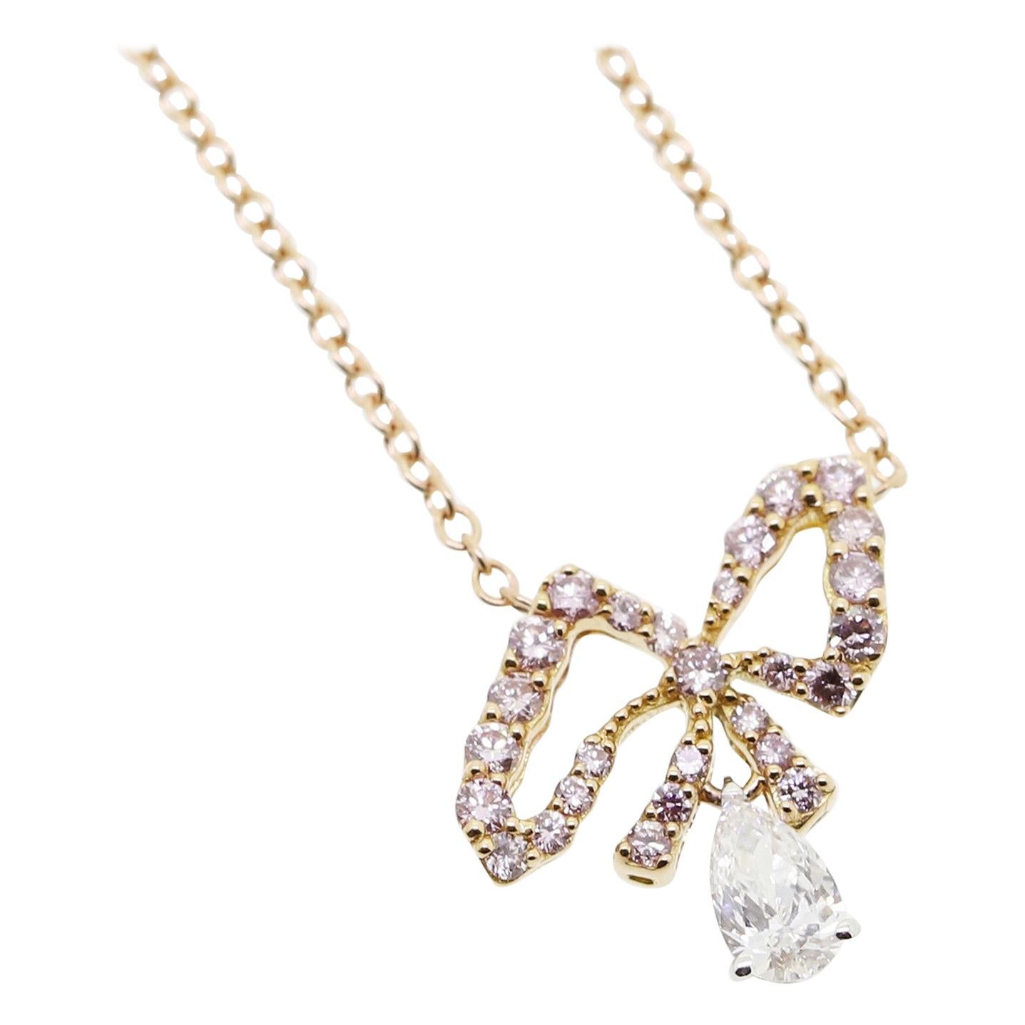 Argyle Pink Diamonds and White Pear Shape Diamonds Bow Pendant Necklace For Sale