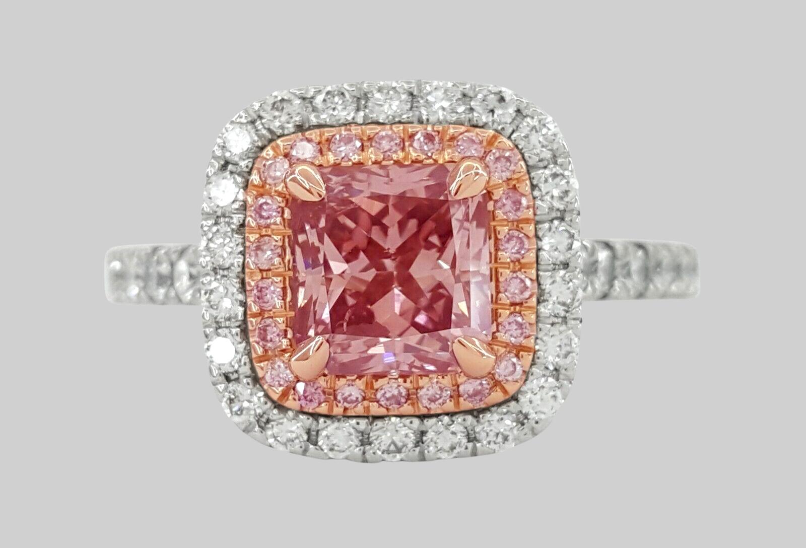 1.87 ct total weight Platinum 18K Rose Gold Radiant Cut Natural Fancy Orangy-Pink Diamond Double Halo Engagement Ring. 
The ring weighs 6.2 grams, size 6, the center stone is a 1.23 ct Natural Radiant Cut, Fancy Orangy-Pink (the diamond main color