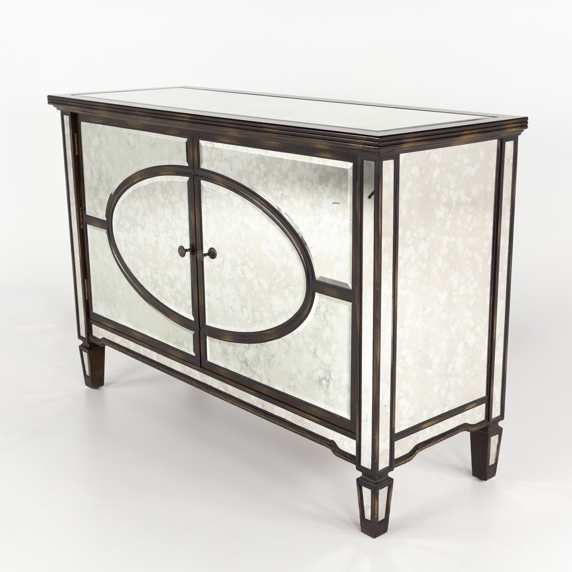 Arhaus contemporary mirrored credenza buffet

This buffet measures: 50 wide x 20 deep x 38 inches high

This piece is in Good Vintage Condition - There are a couple of scratches in the glass, one on top of the piece. The door handle is bent and