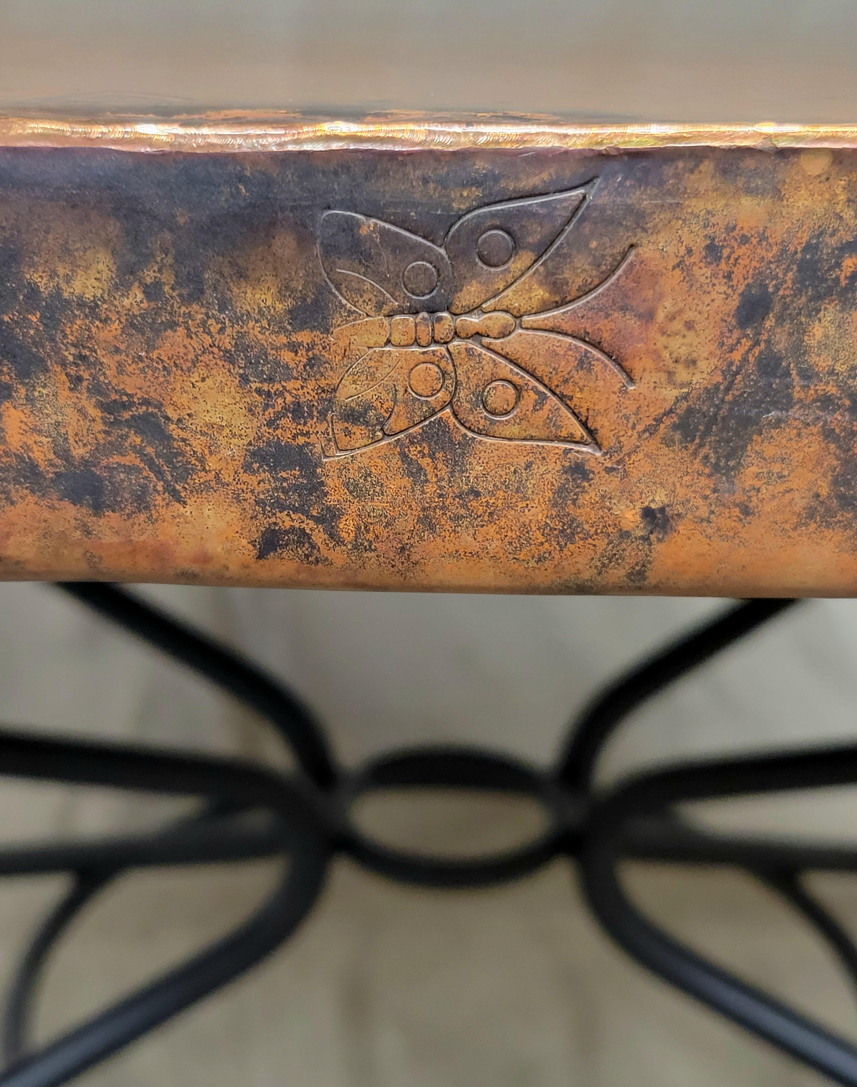 Arhaus Dining Table With Hammered Copper Top and Iron Arabesque Base 1