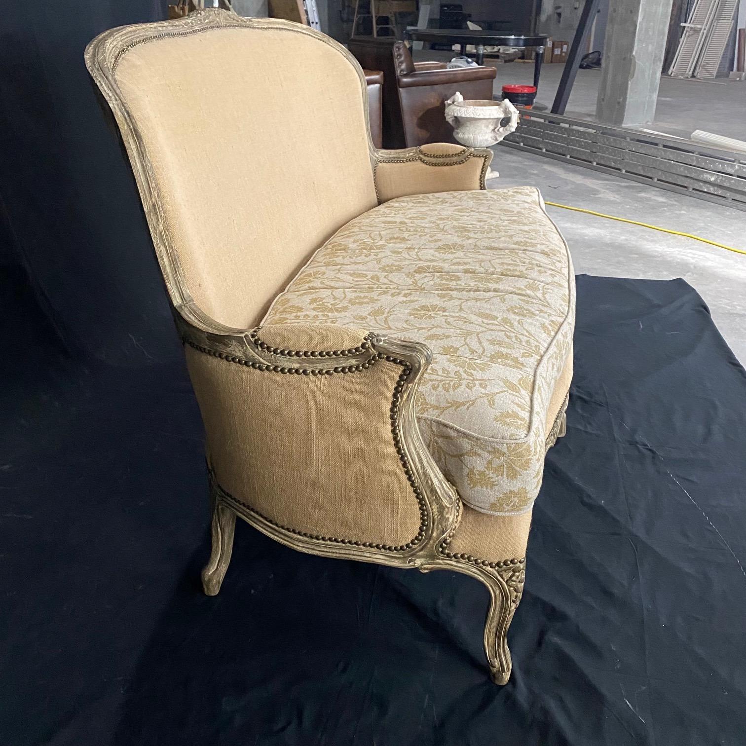 Vintage French Louis XV style Arhaus Charlotte Collection sofa or couch featuring lovely and immaculate upholstery and classic carved wood frame. Beautiful contrasting original immaculate seat cushion!
arm height 24.75

#2816.