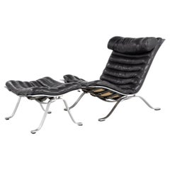 Vintage 'Ari' lounge chair with matching stool by Arne Norell