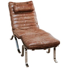 Ari Lounge Chair and Ottoman by Arne Norell, Leather and Steel