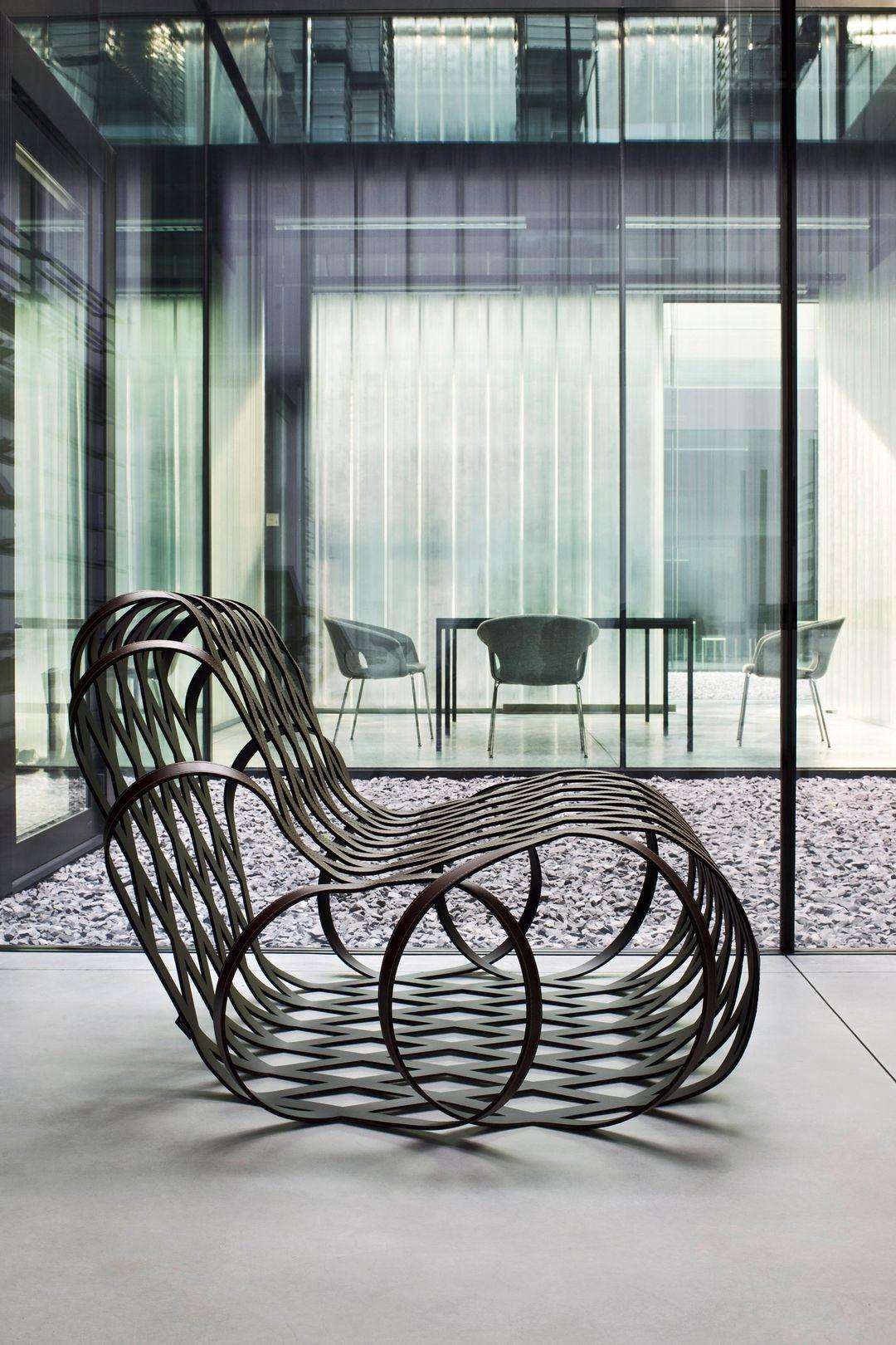 Aria, a new chaise longue designed by Antonio Rodriguez for La Cividina.? This collaborative effort combines advanced technology and craftsmanship.? The Aria chair is produced by precisely laser cutting a sheet of steel to create rhombuses that form