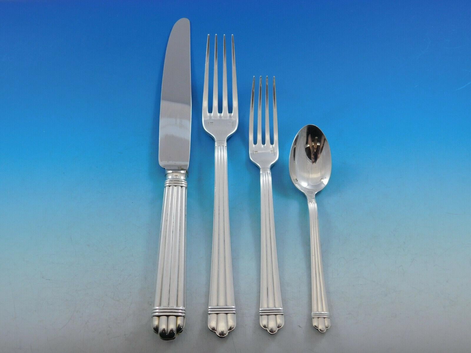 Dinner size Aria by Christofle France estate silver plate flatware set, 52 pieces. This set includes:

8 dinner size knives, 9 3/4
