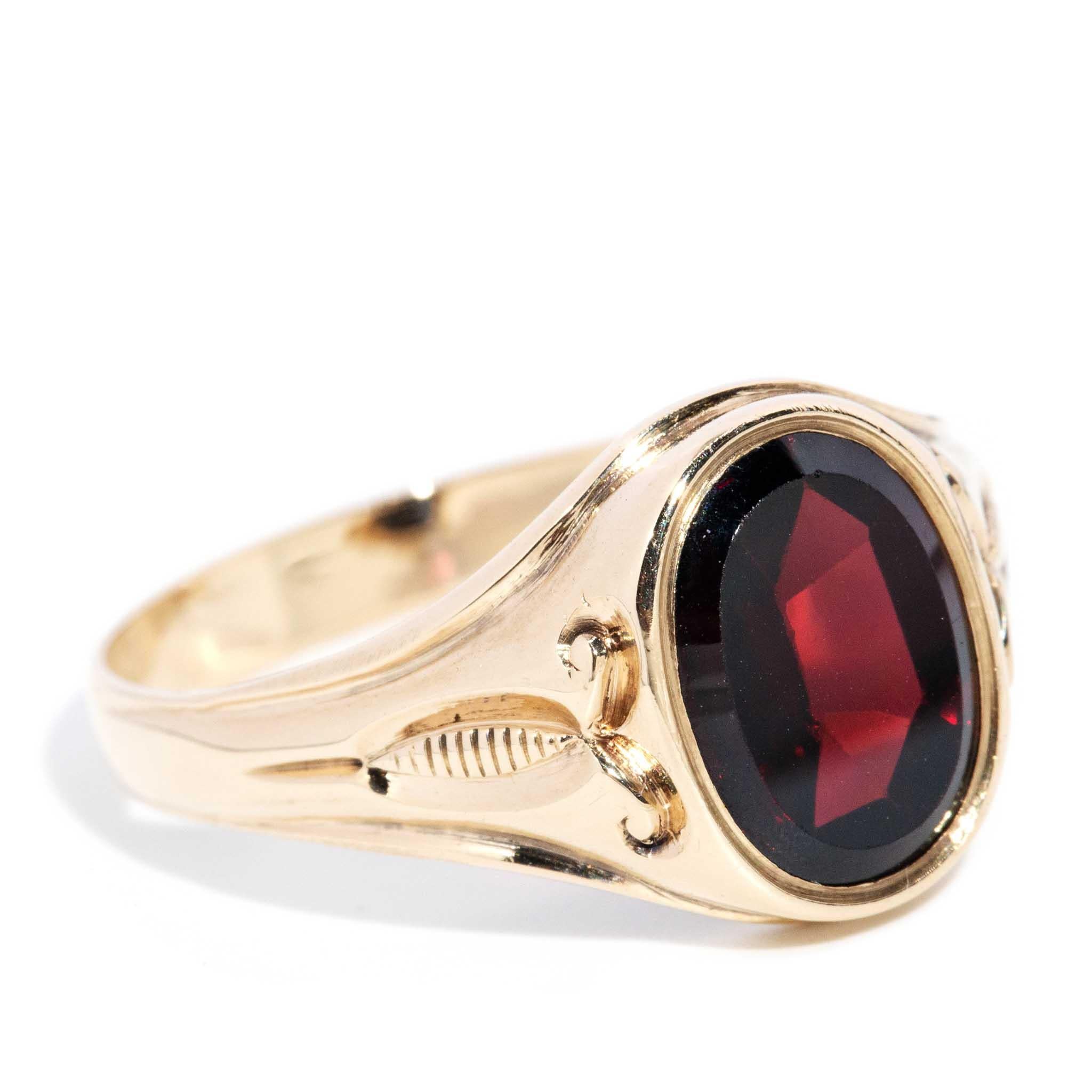 Modern Vintage Circa 1970s Rhodolite Oval Shaped Garnet Ring 14 Carat Yellow Gold