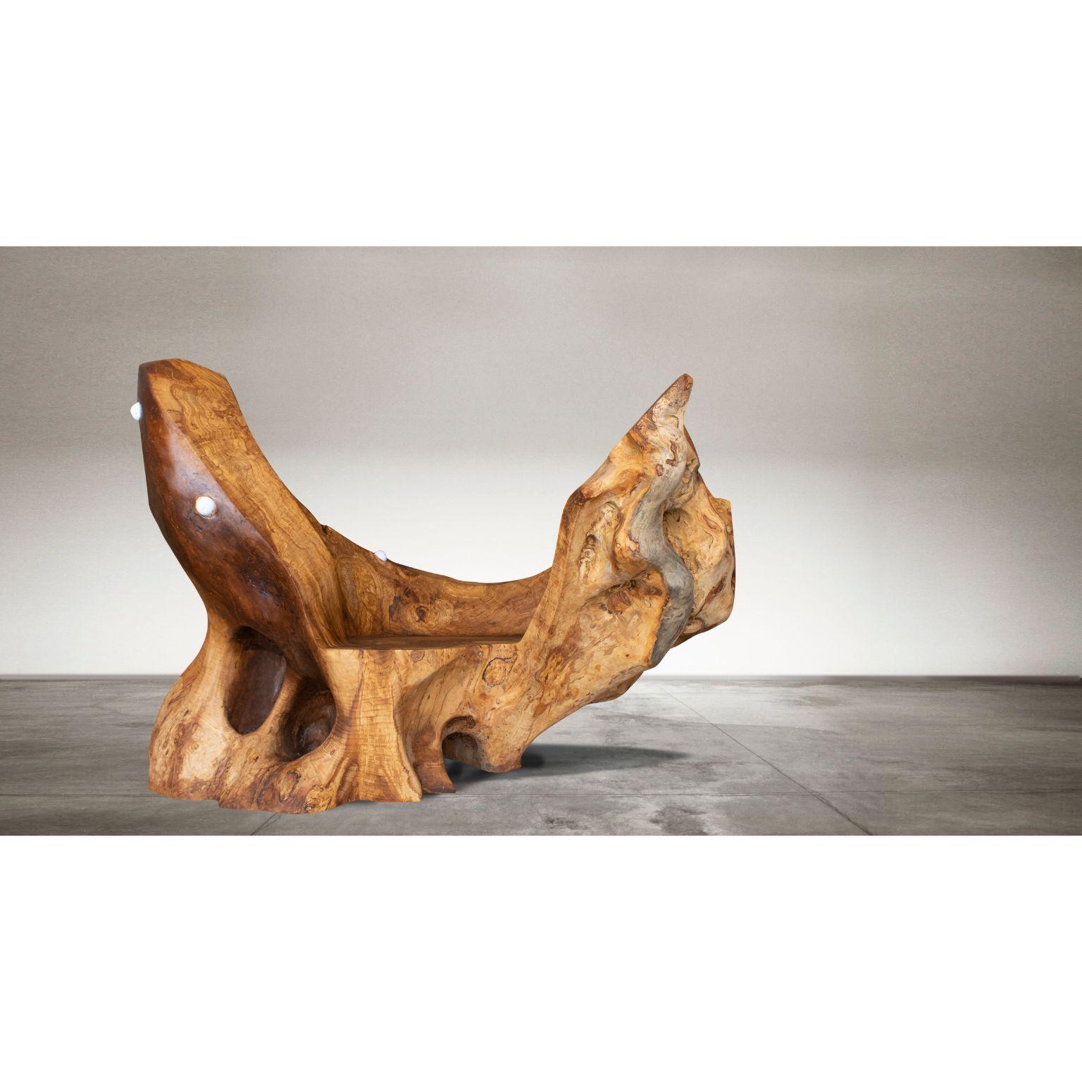 Ariadna bench by Woody Fidler
Materials: Olive wood
Dimensions: W 150 x D 100 x H 105 cm

Woody Fidler feels honored to live in a country where olive growing dates back to 4000 BC, as documented in Minoan civilization.
Deep love for the earth