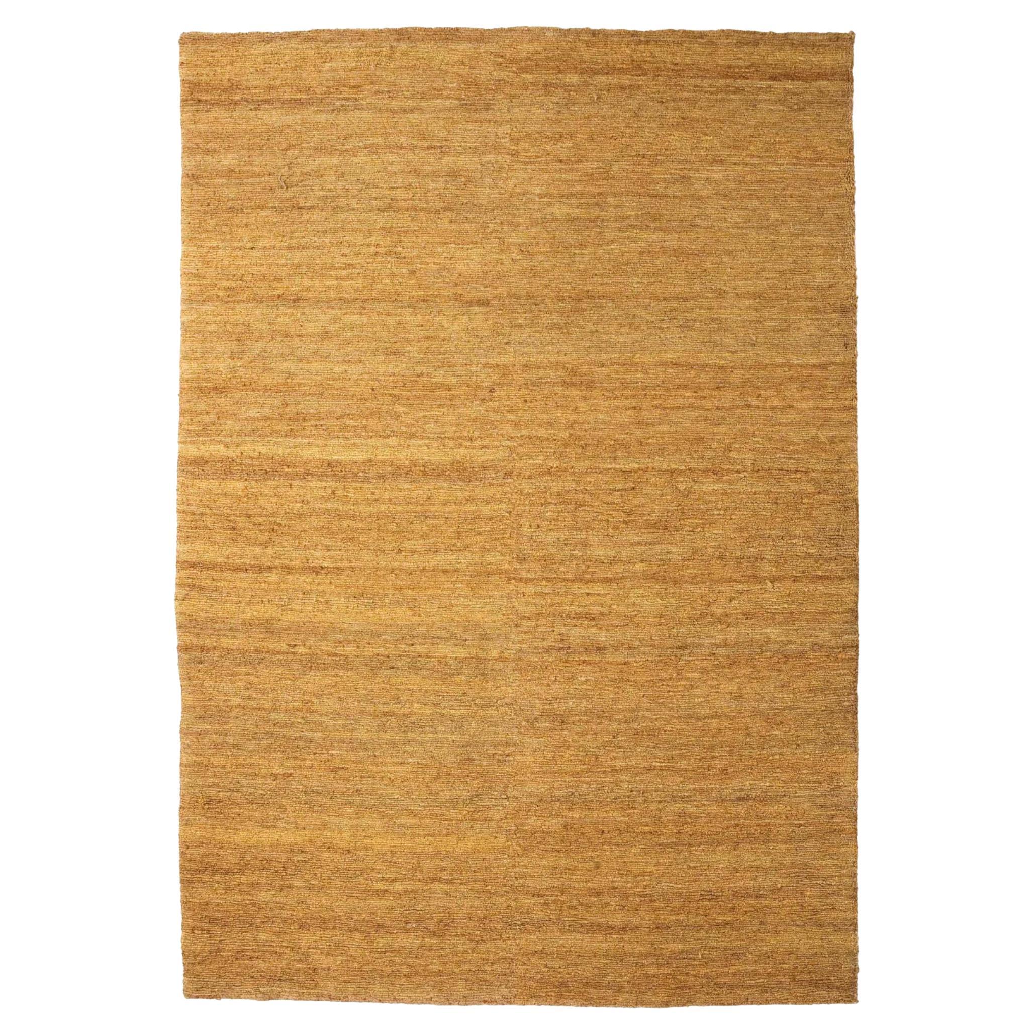 Ariadna Miquel y Nani Marquina Alfombra "Tierra" de yute 200 x 300 cm en ocre