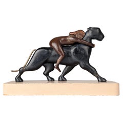 Ariadna y la pantera, escultura Art Déco en madera y latón, años 20