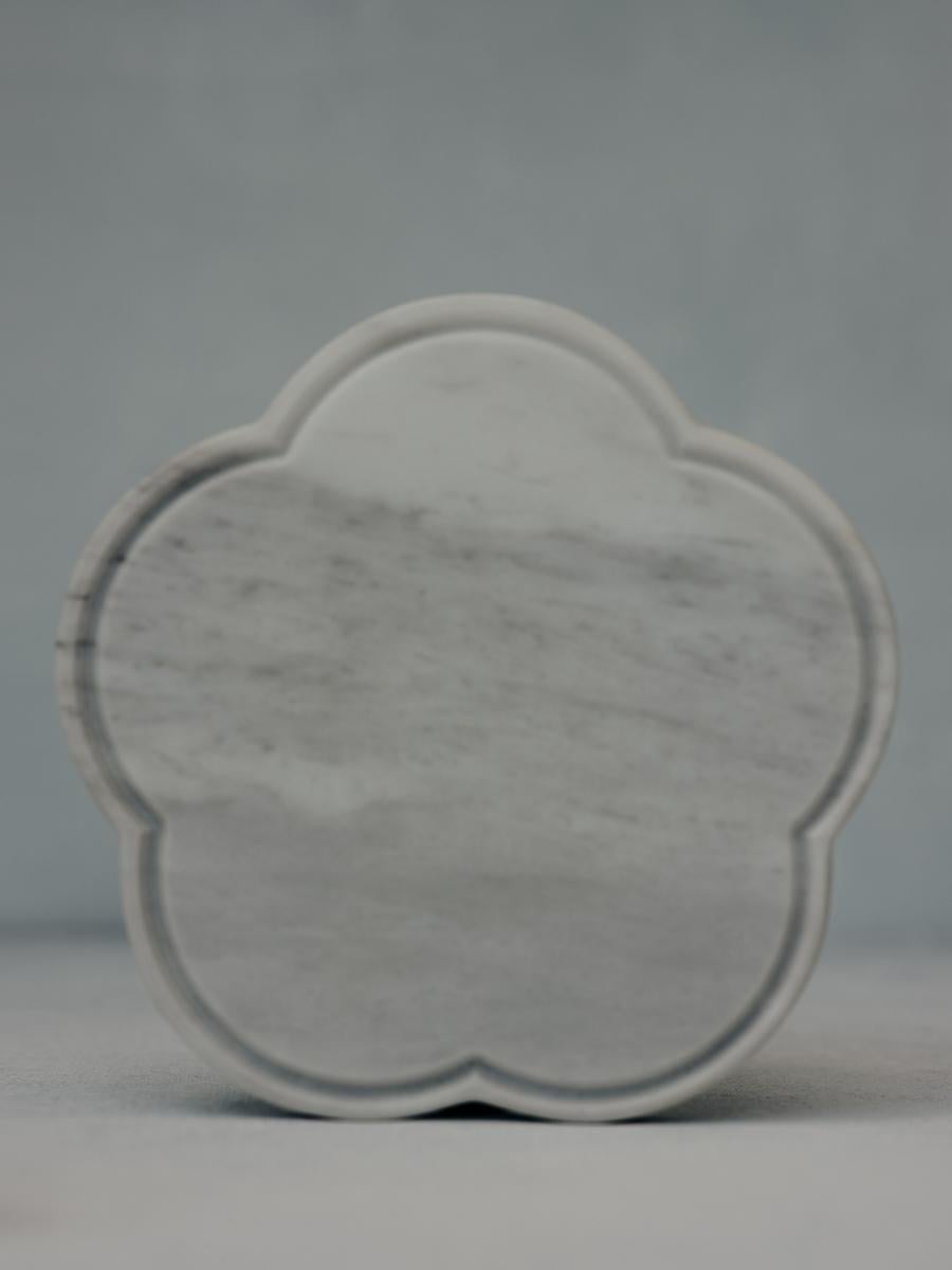 Ariadne coasters in white Volakas marble by Faye Tsakalides. 
Dimensions: 12 W x 12 L x 1 H cm
Materials: White Volakas marble. 
Technique: Crafted from a single piece of marble. Hand-crafted, Polished. Mat finished. 

Faye Tsakalides is a